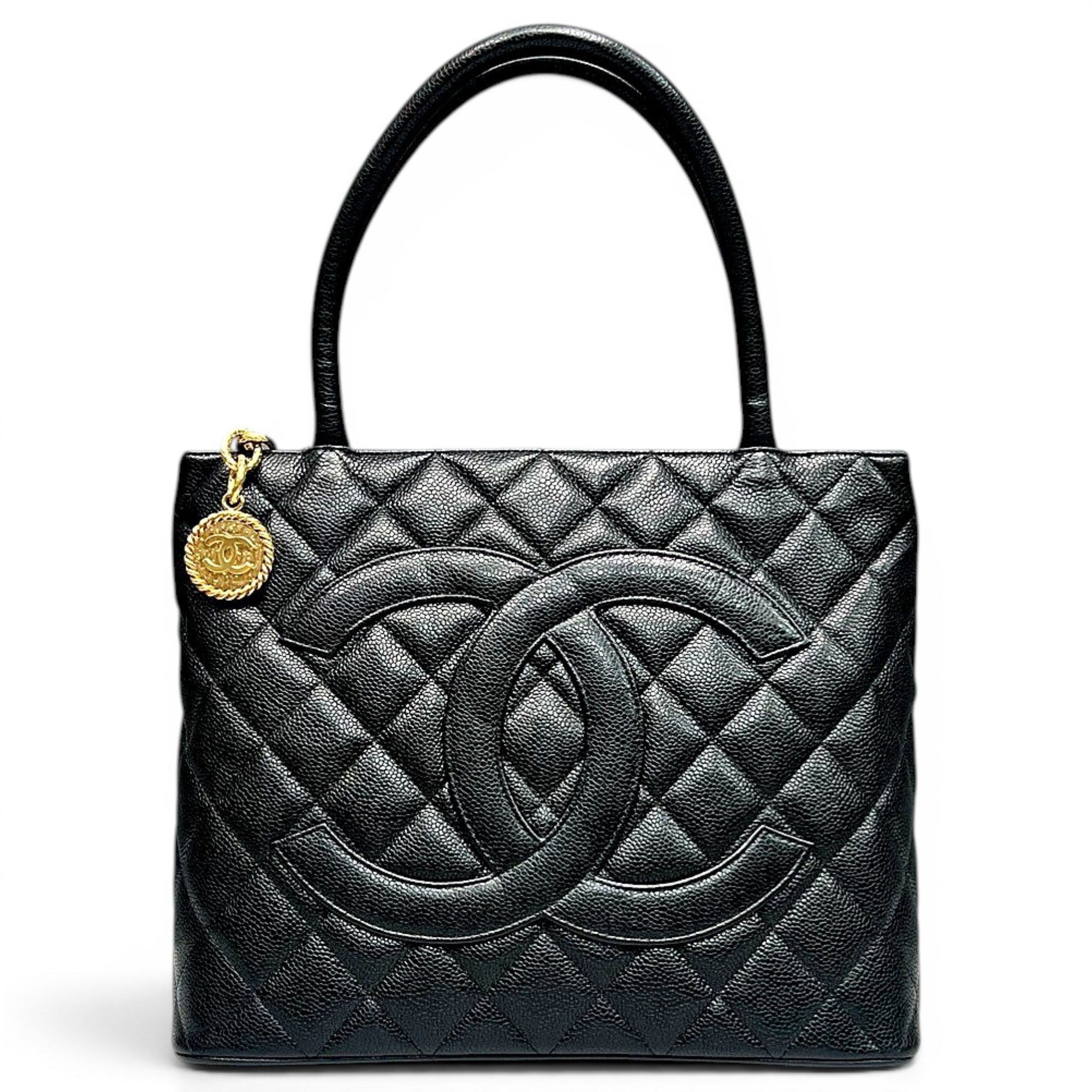 Médaillon leather handbag