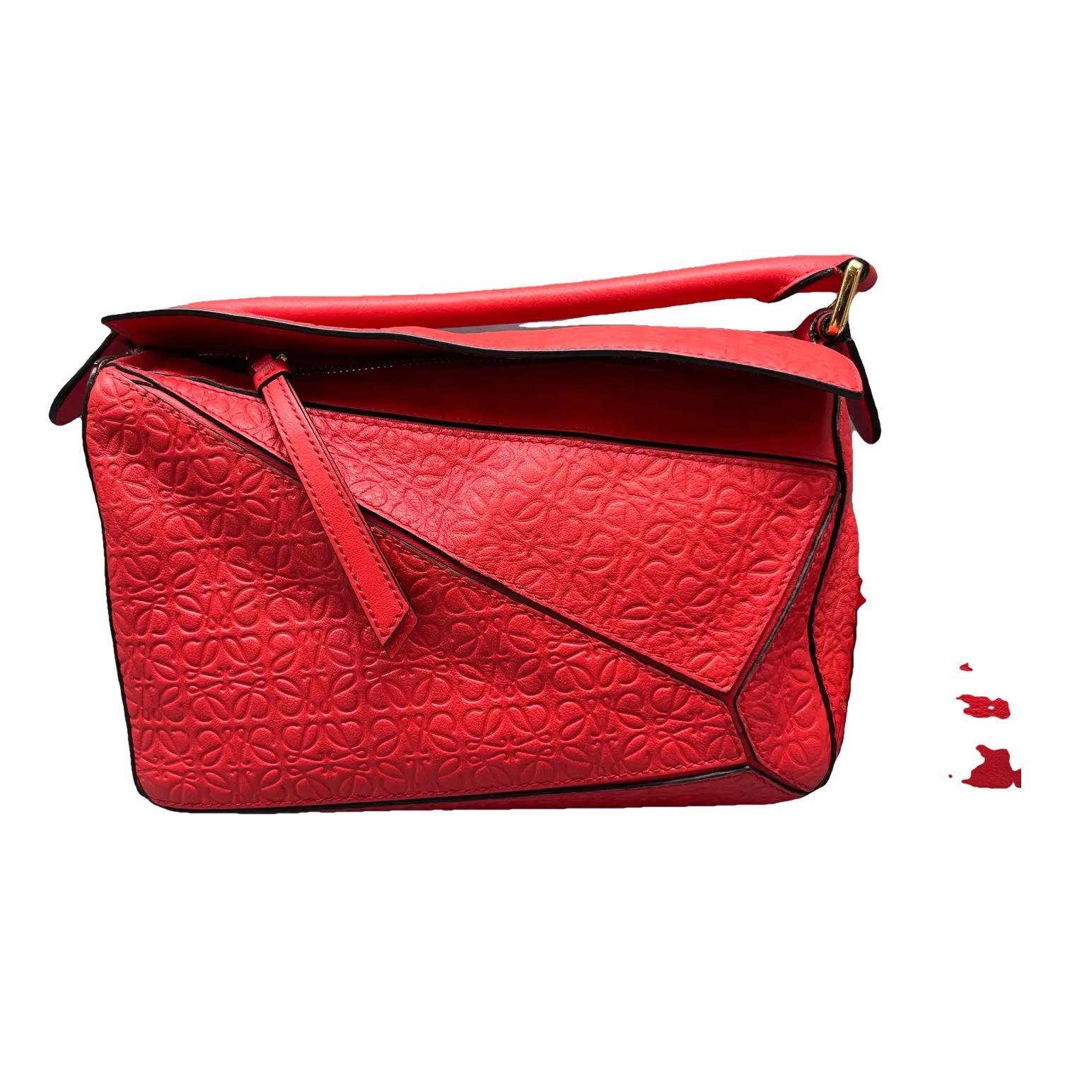 Puzzle leather crossbody bag
