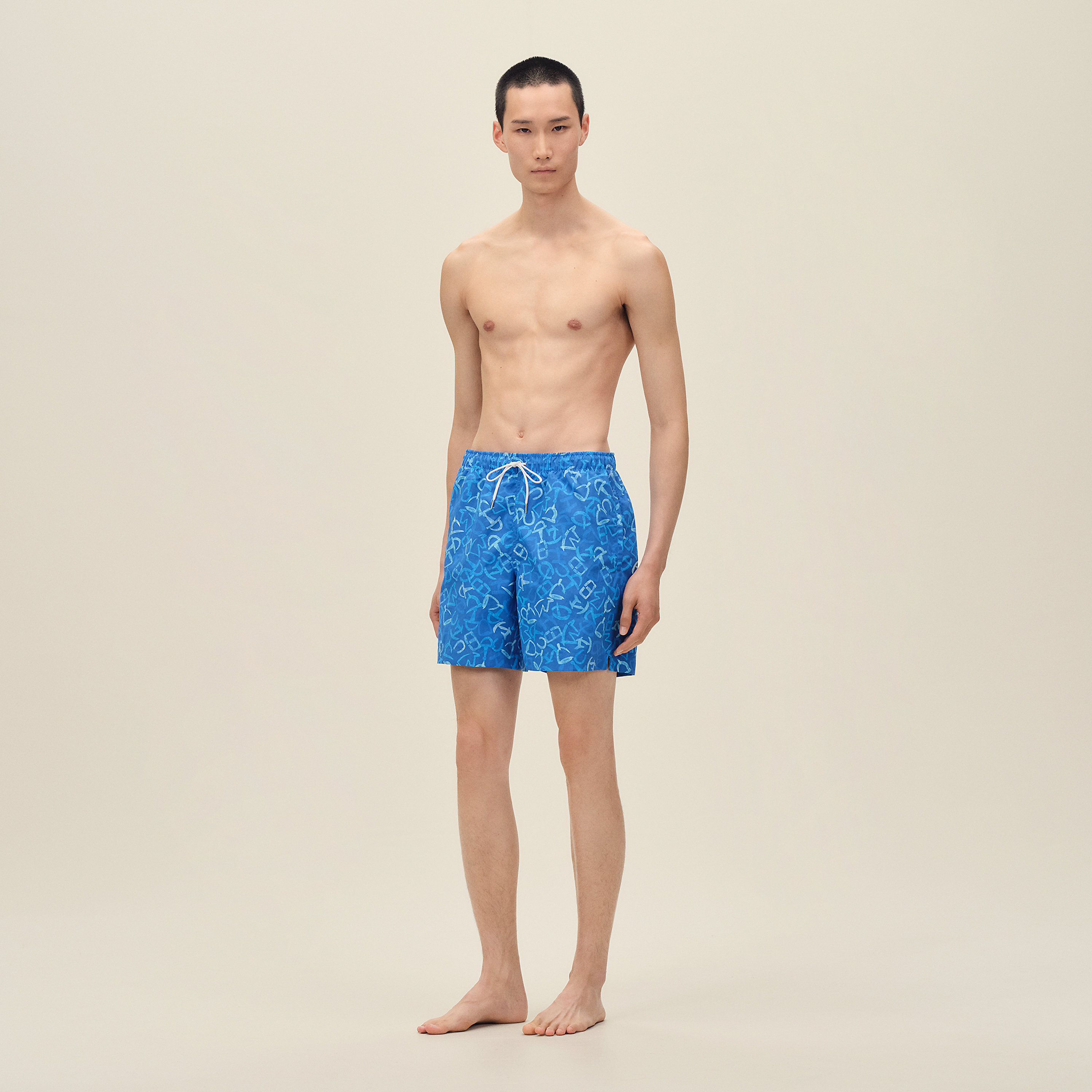 "Calligraphie Equestre" swim trunks