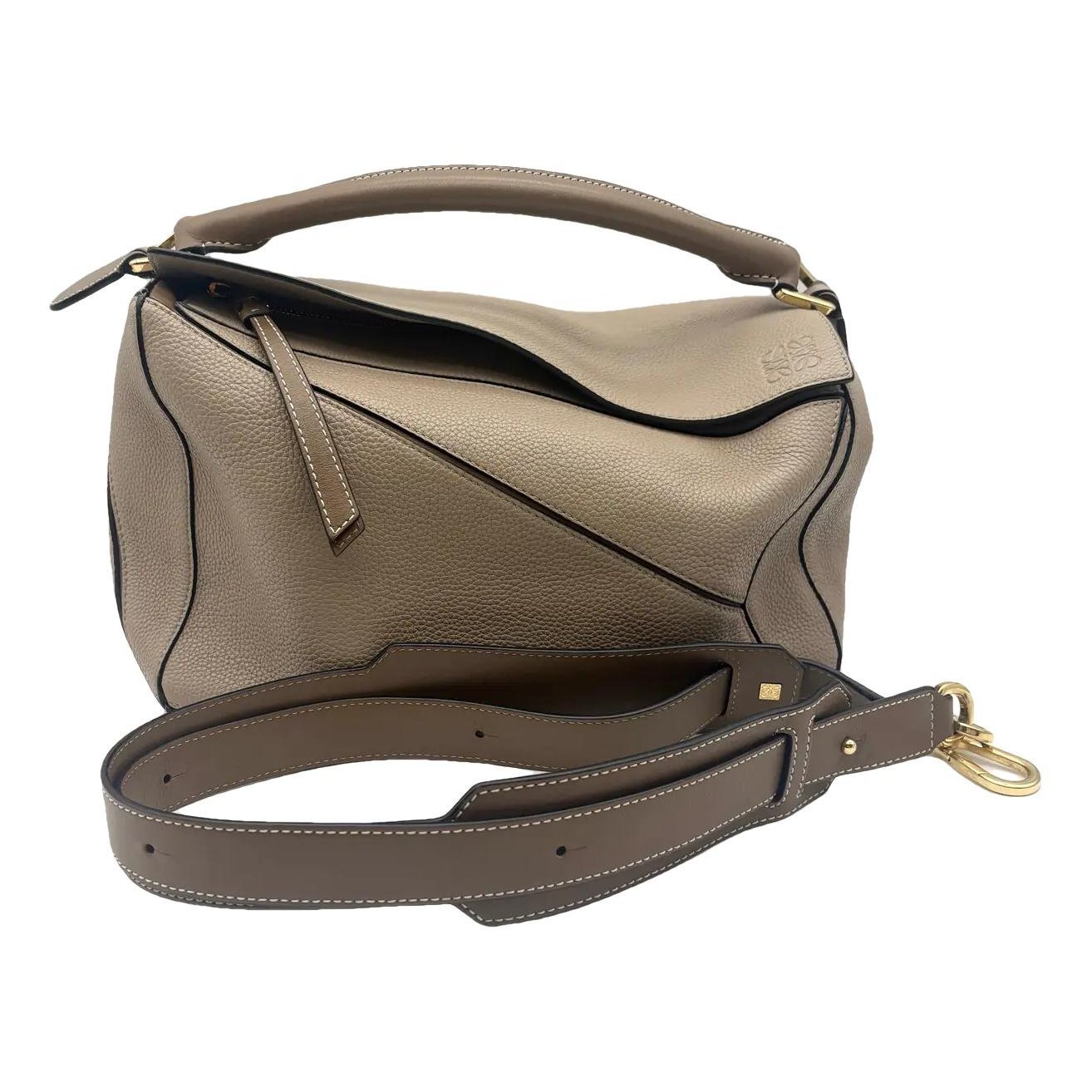 Puzzle leather crossbody bag