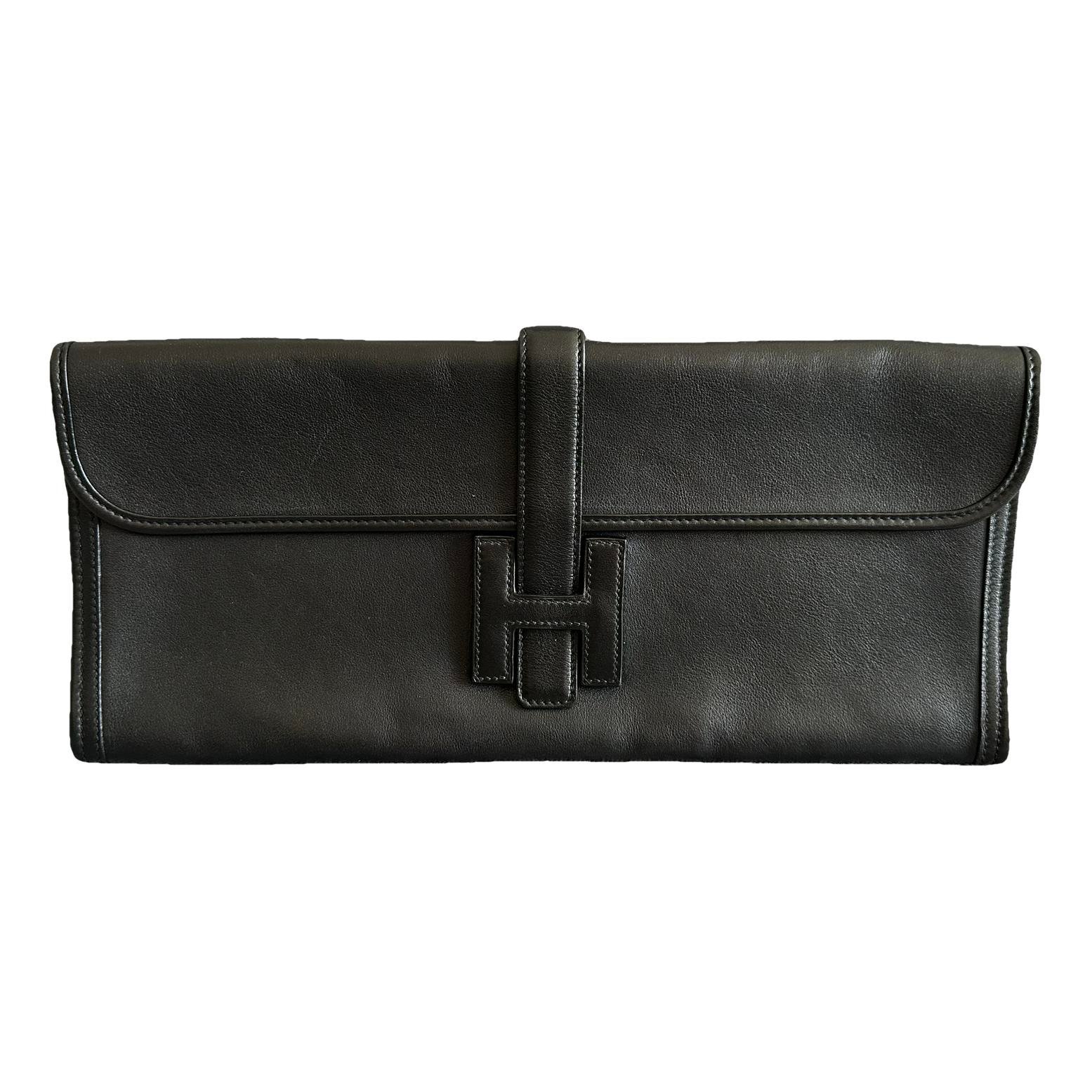 Jige leather clutch bag
