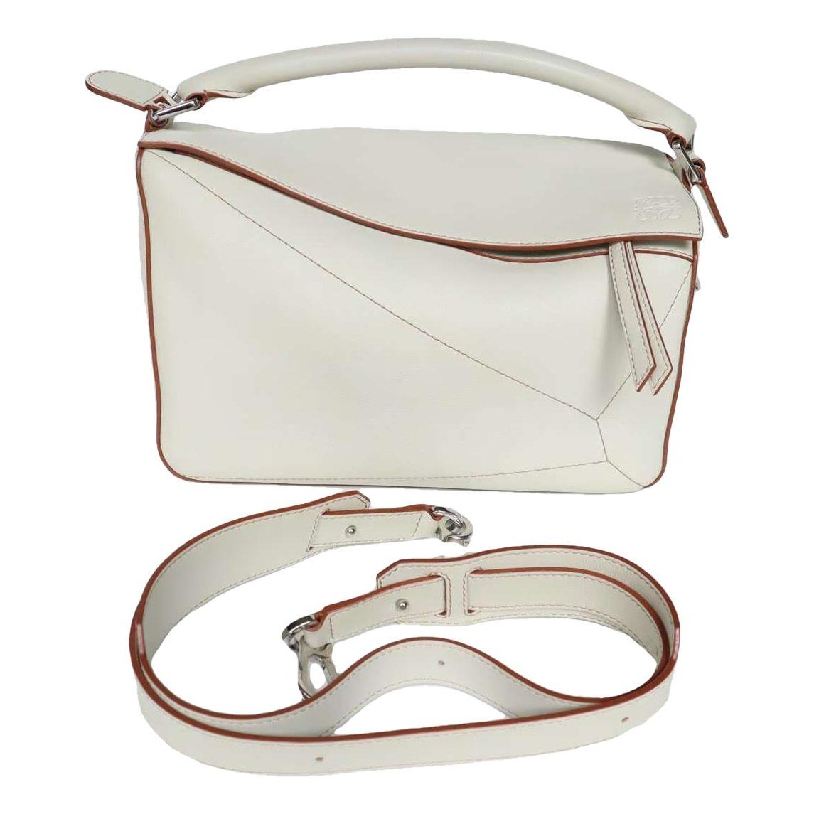 Puzzle leather handbag