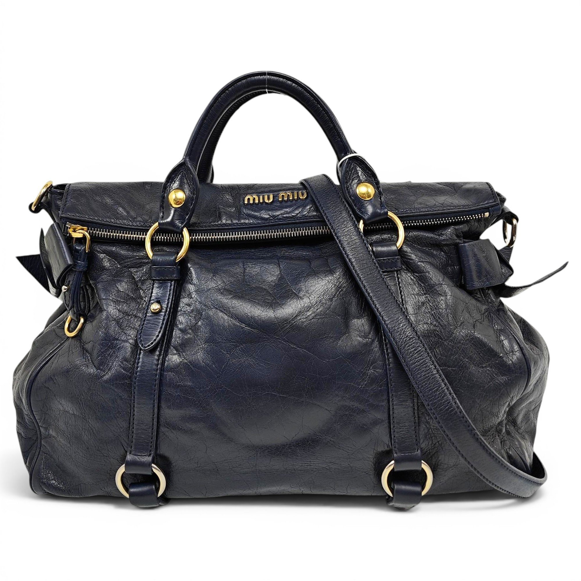 Bow bag leather handbag