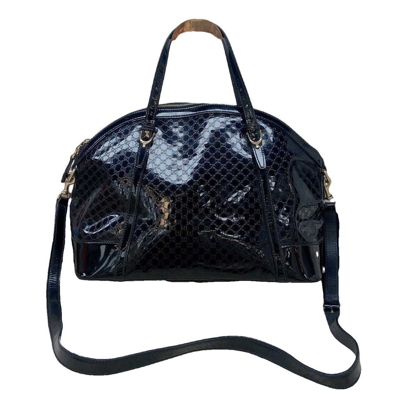 Dôme patent leather handbag