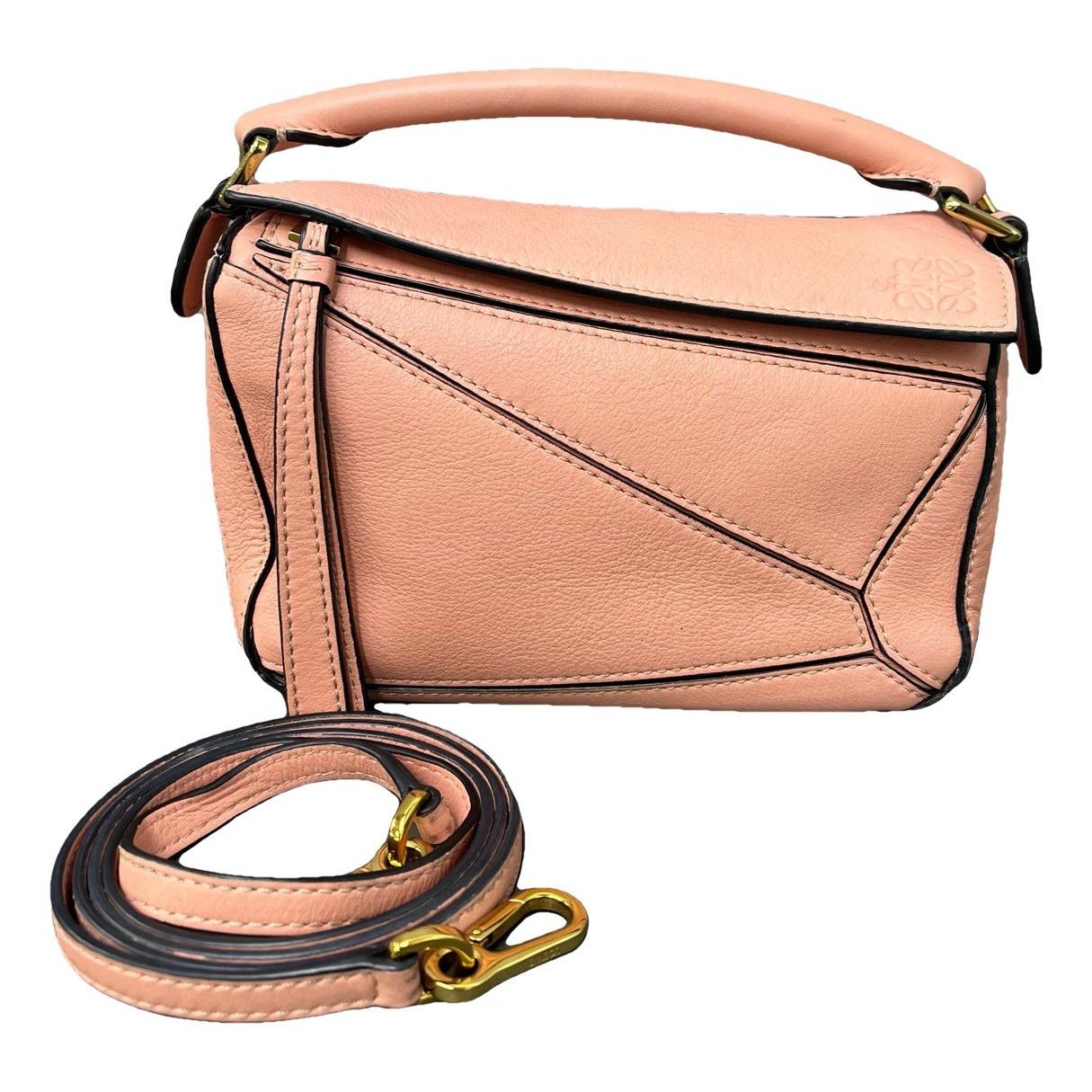Puzzle leather handbag