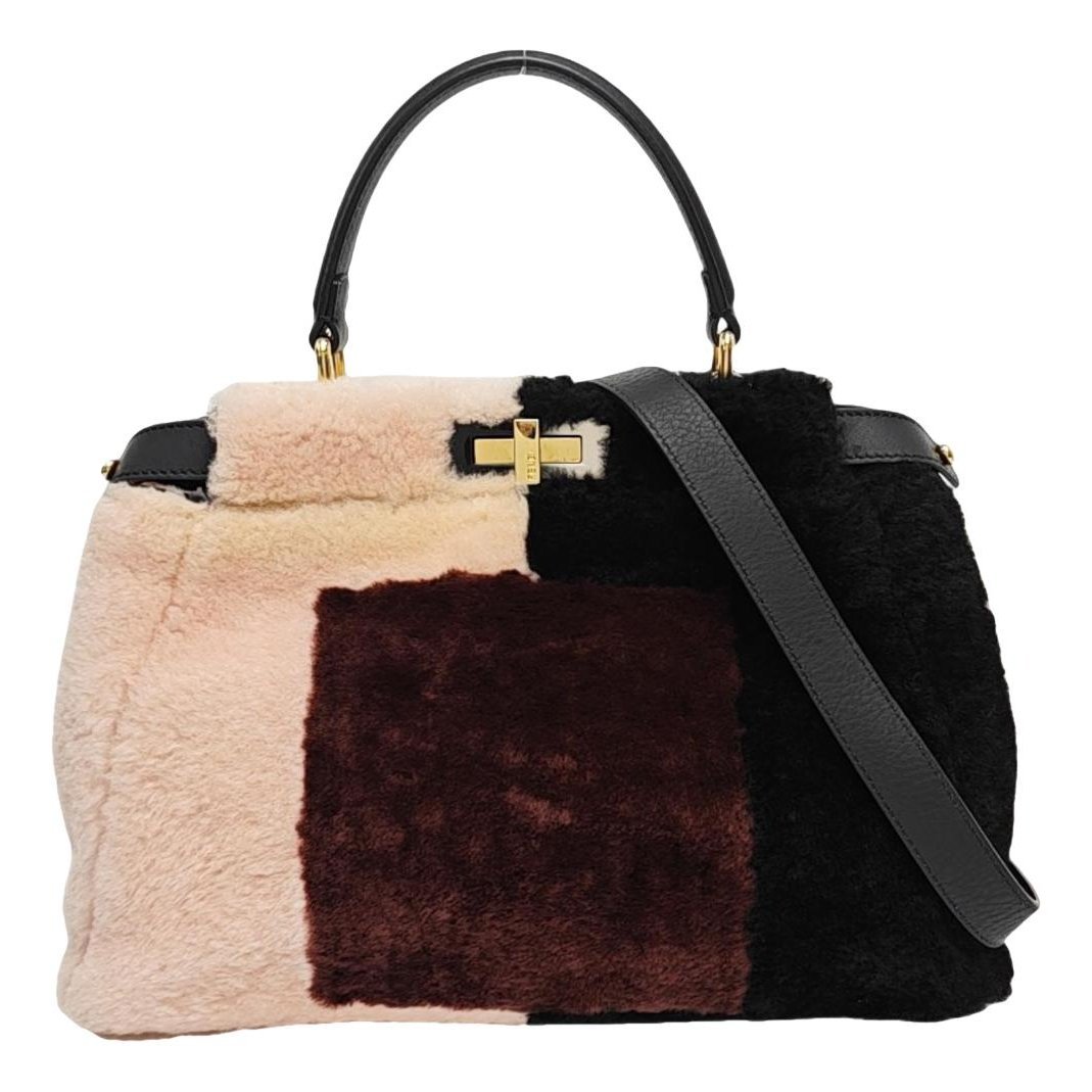 Peekaboo cloth handbag