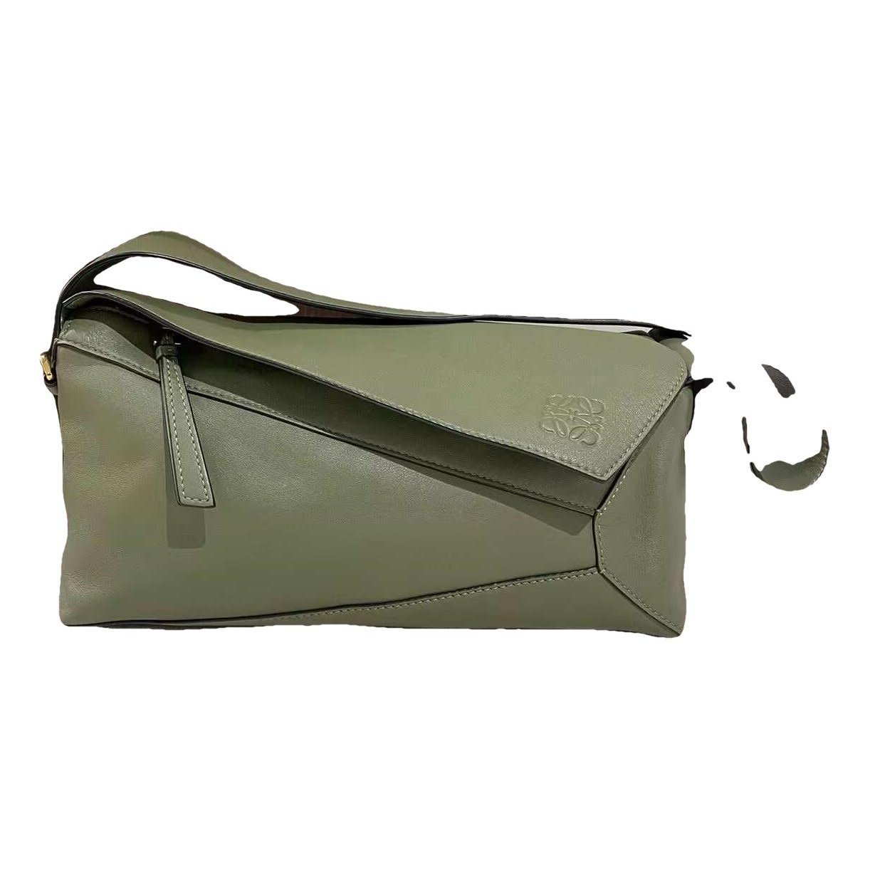 Puzzle leather handbag