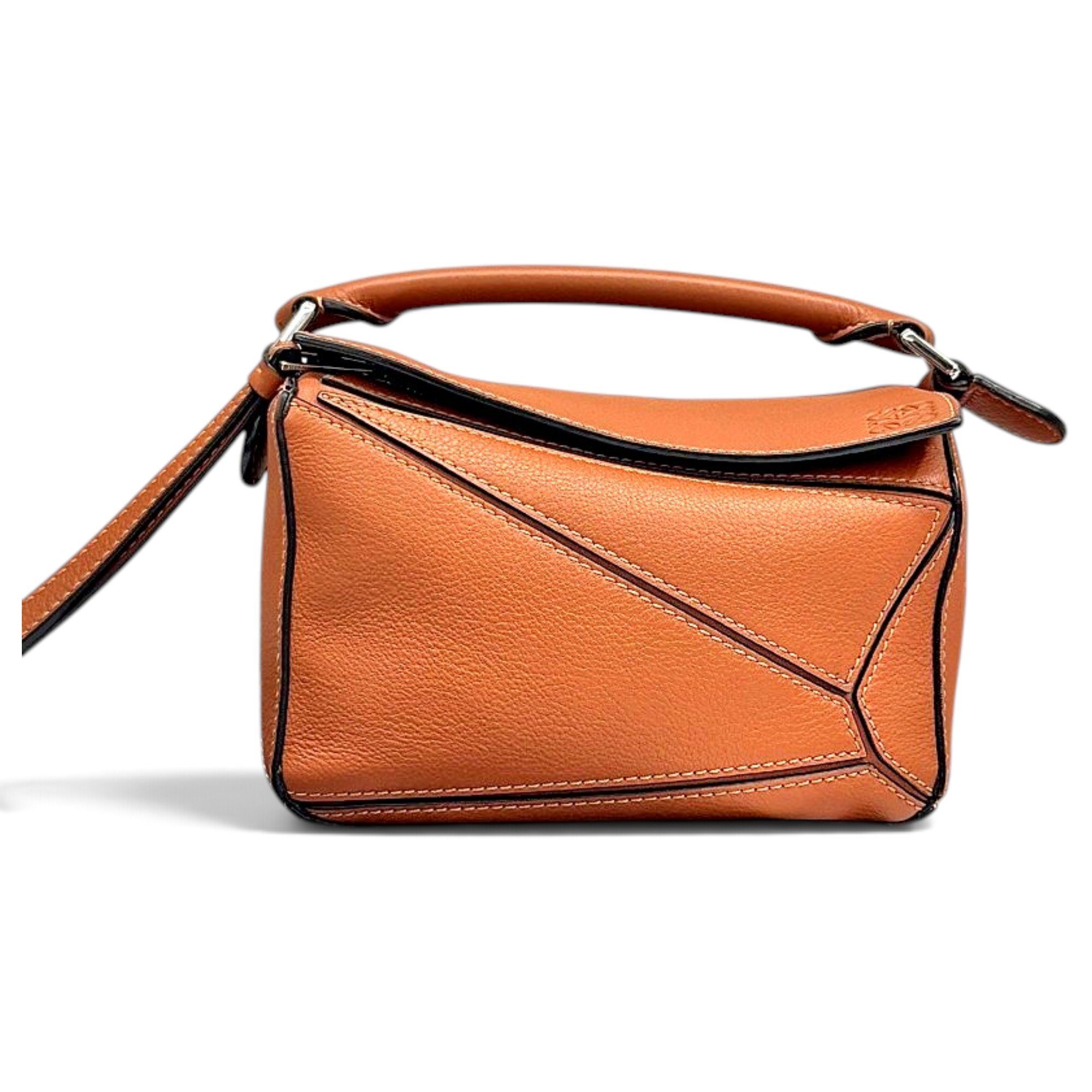 Puzzle leather handbag