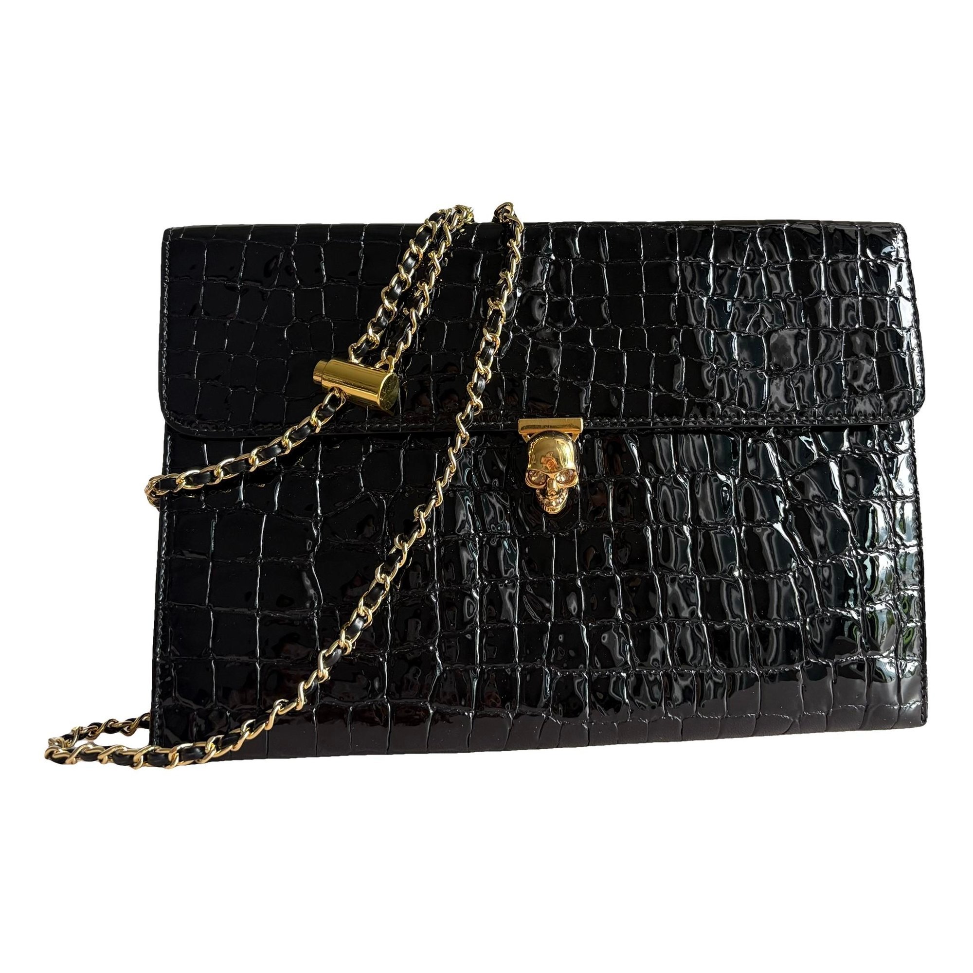 Knuckle patent leather bag