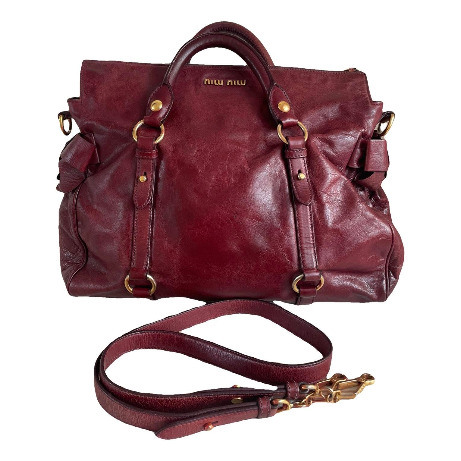 Bow bag leather handbag