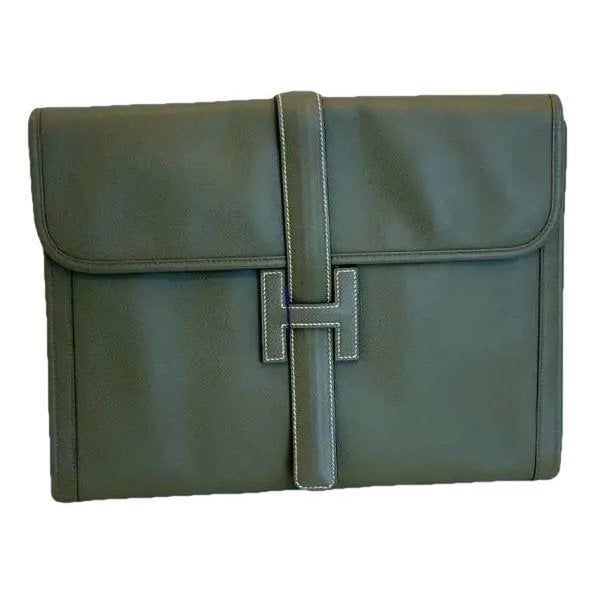 Jige leather clutch bag