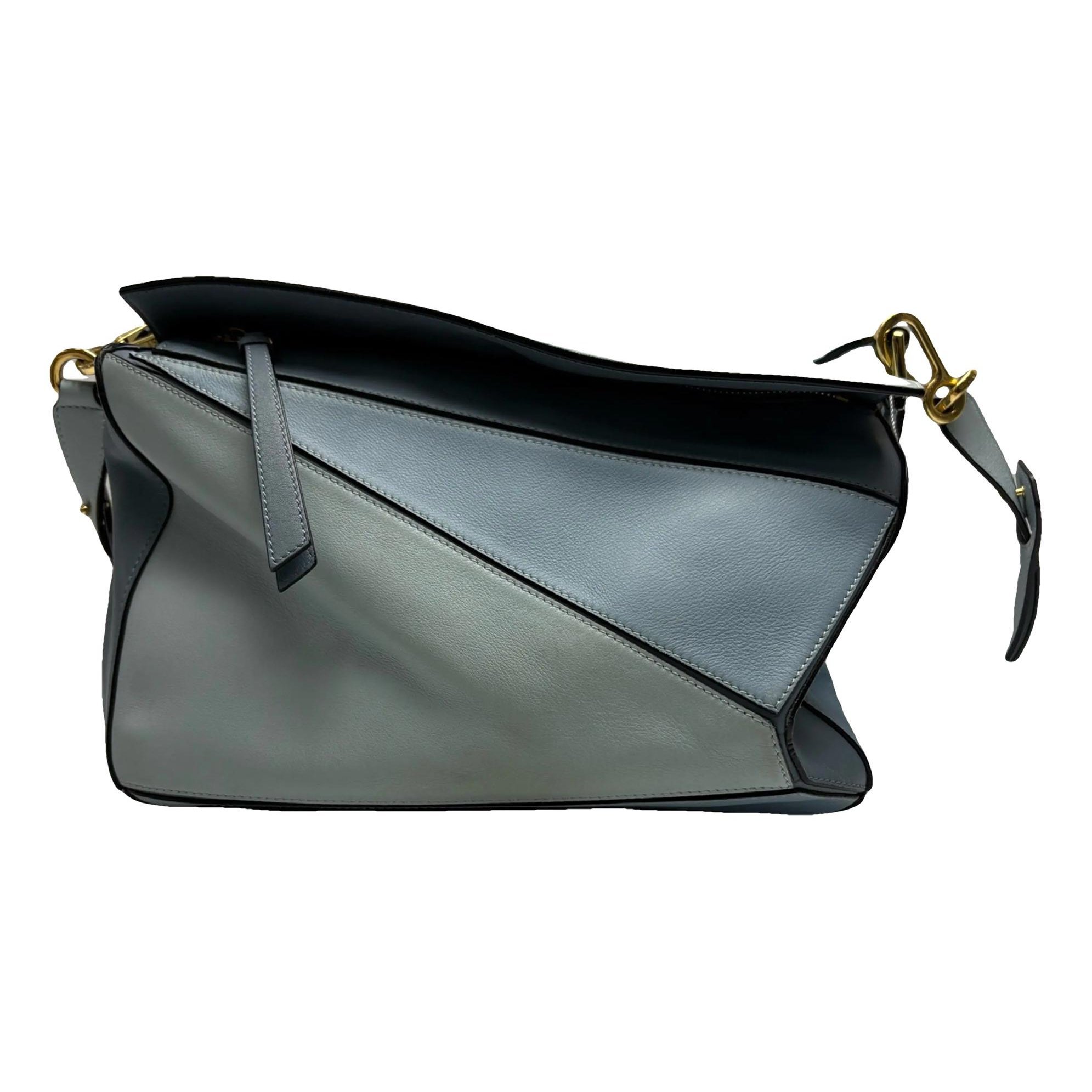 Puzzle leather handbag