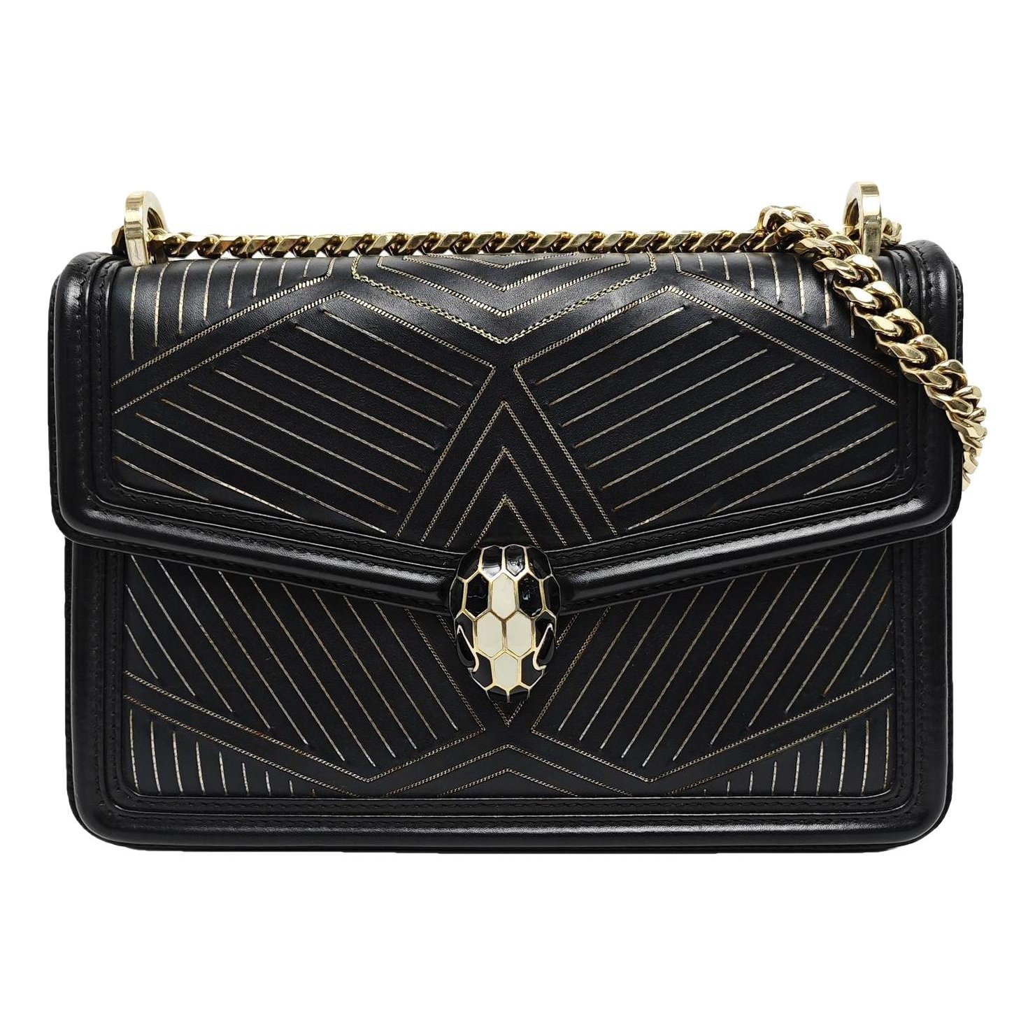 Serpenti leather handbag
