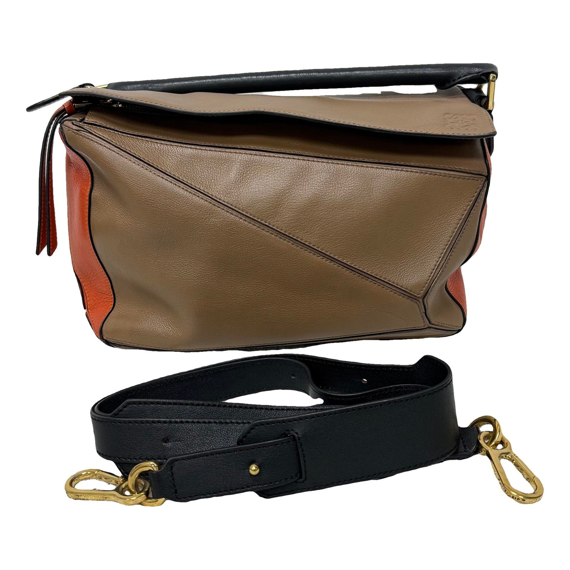 Puzzle leather handbag