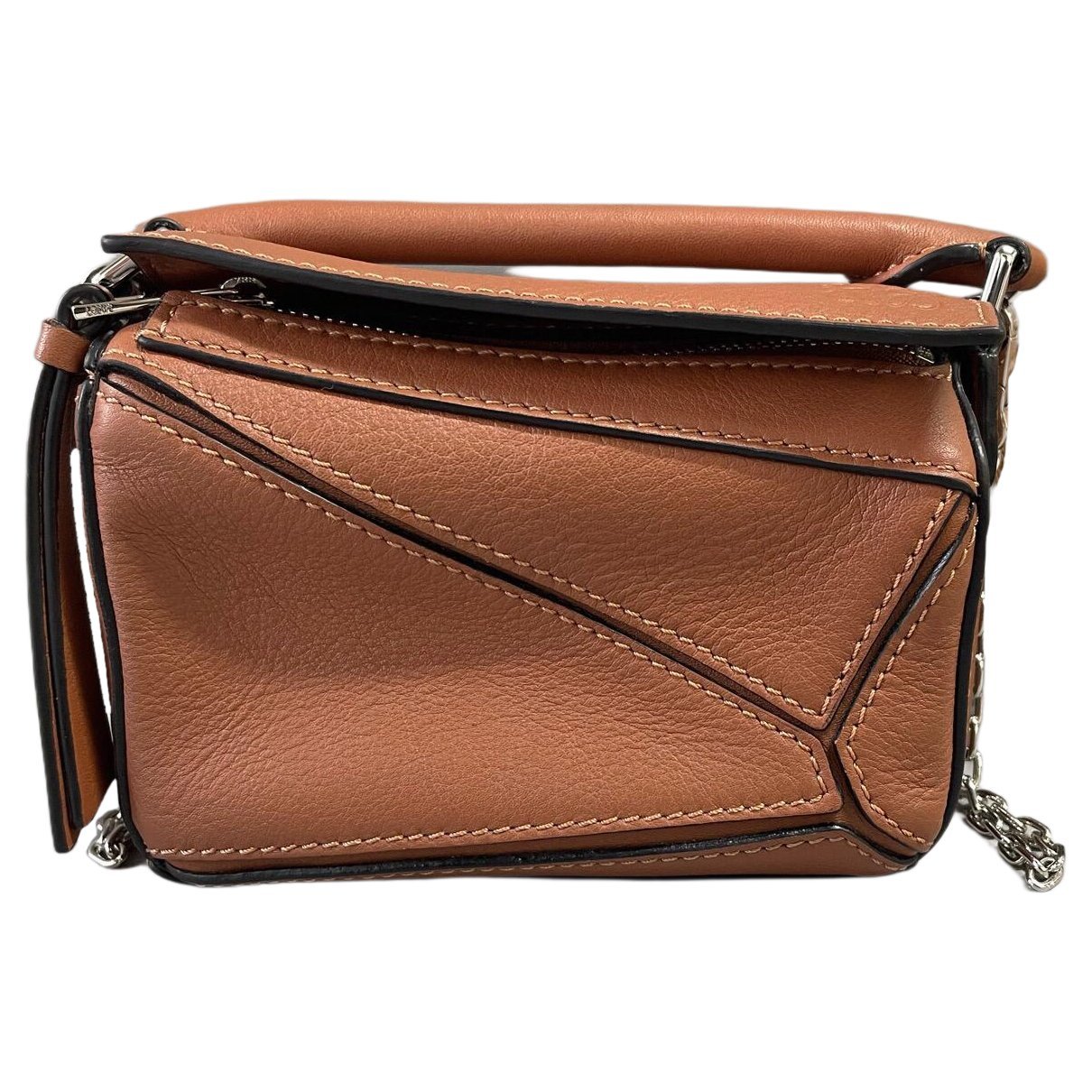 Puzzle leather handbag