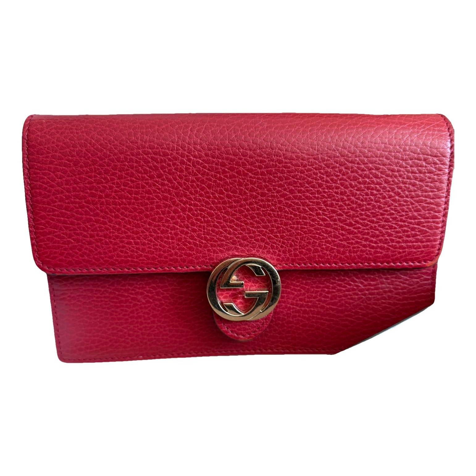 Interlocking leather clutch bag