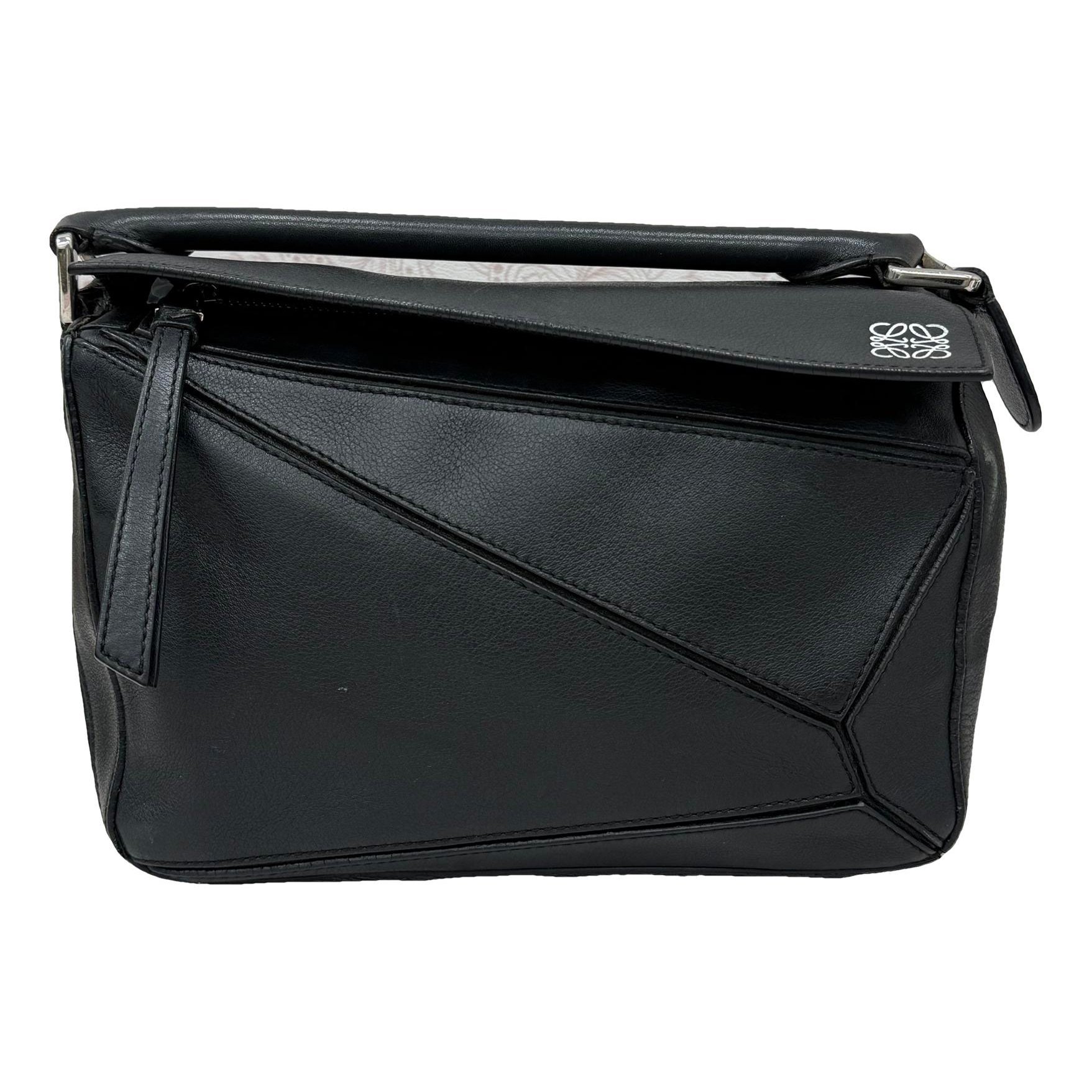 Puzzle leather handbag