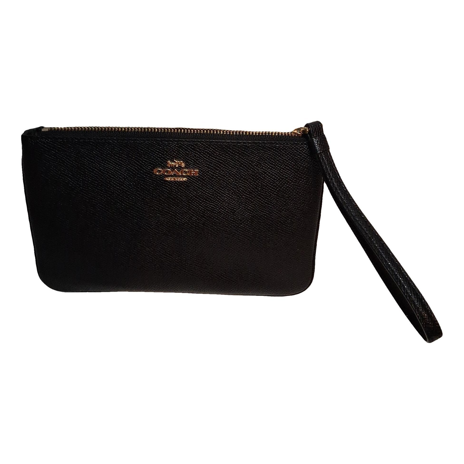 Patent leather clutch bag