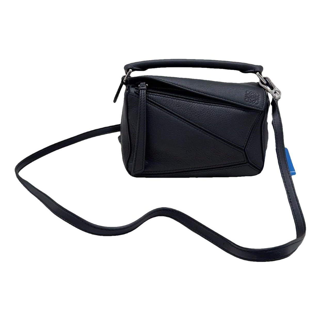 Puzzle leather handbag