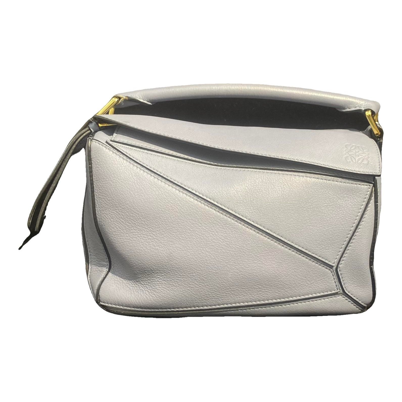 Puzzle leather handbag