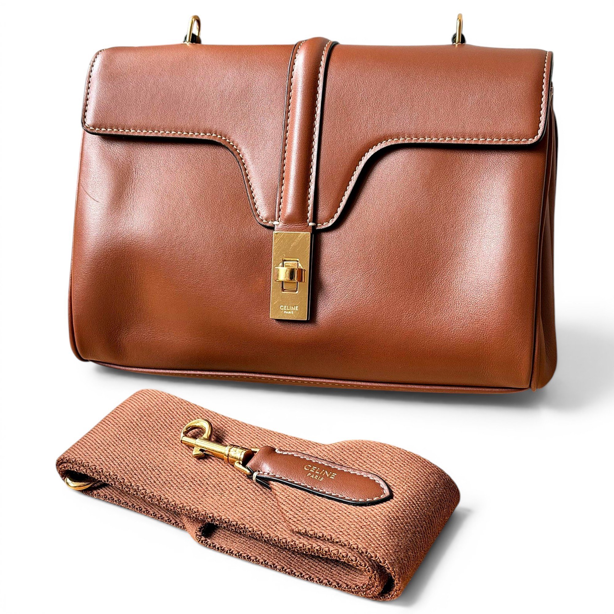 Clasp leather handbag