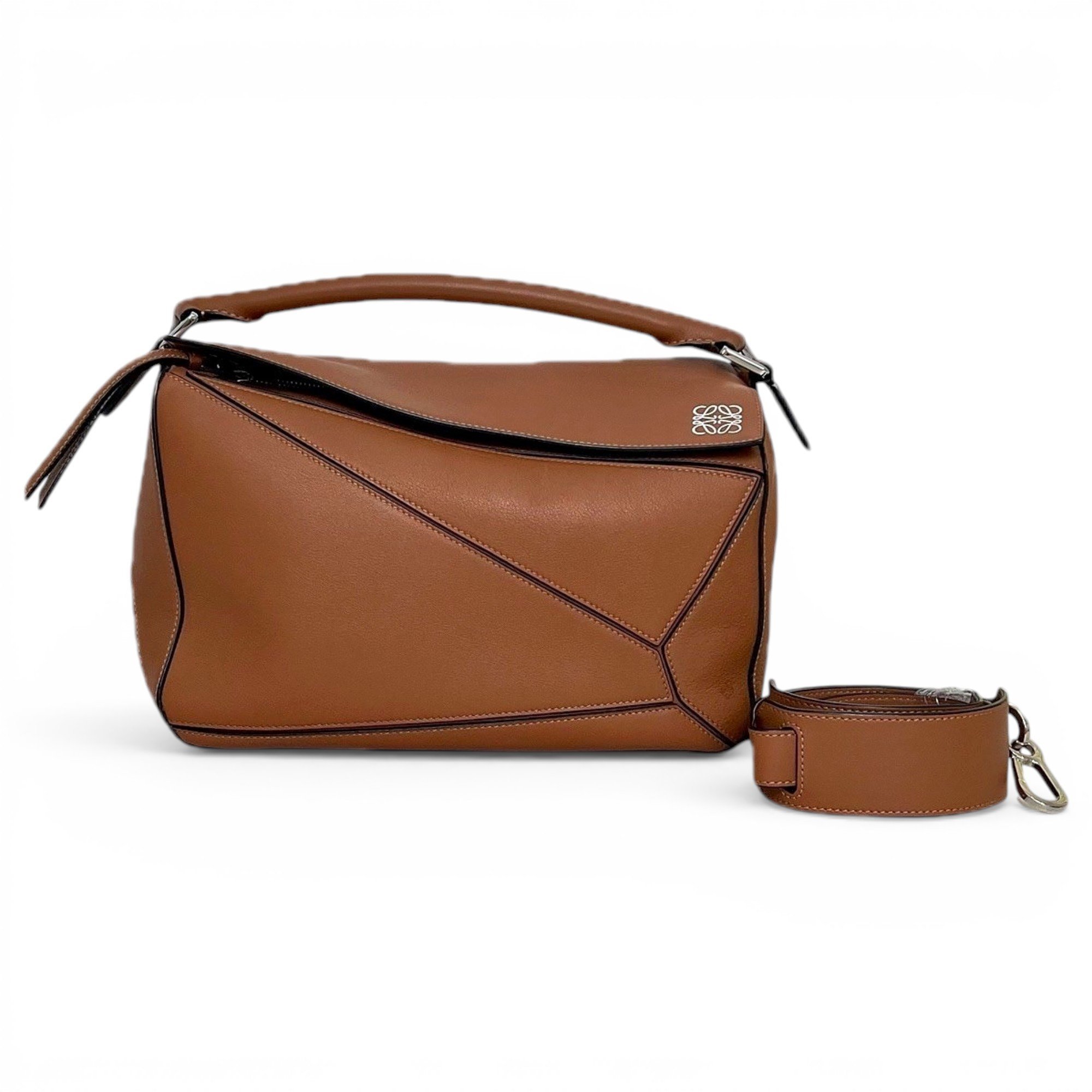 Puzzle leather handbag