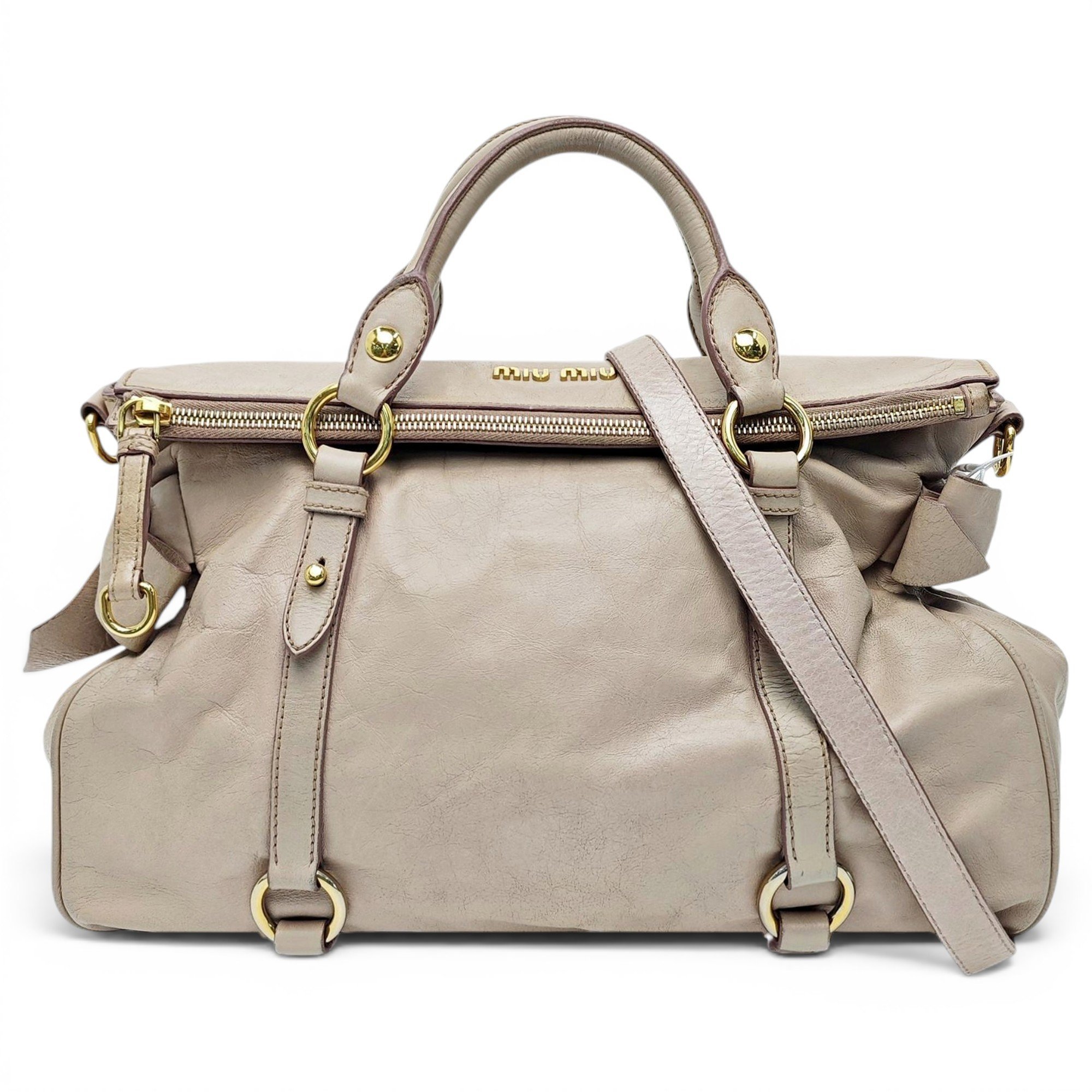 Bow bag leather handbag
