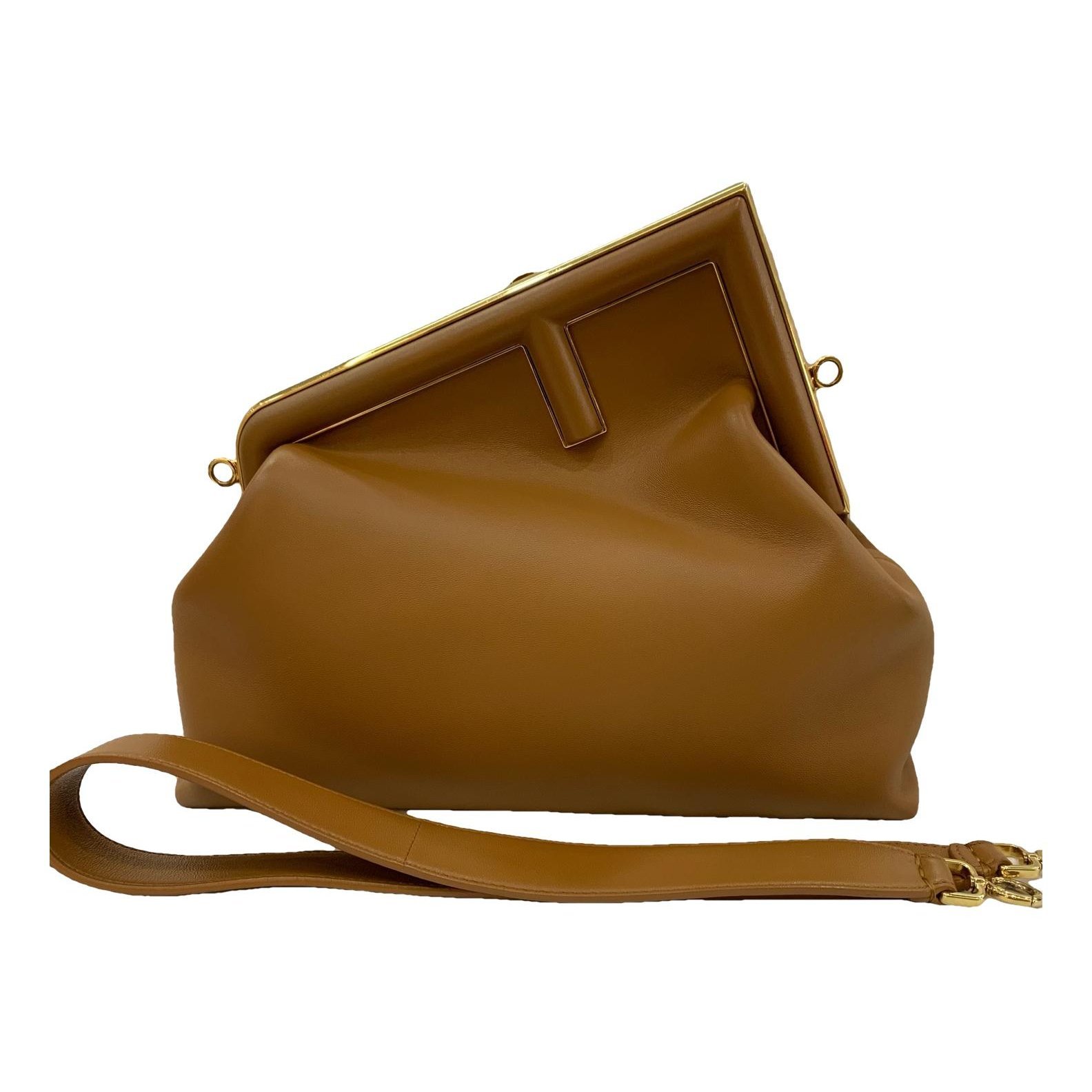 First leather handbag