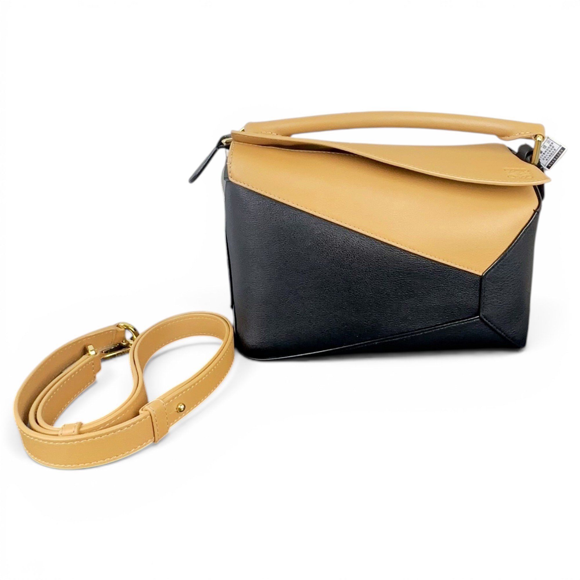 Puzzle leather handbag