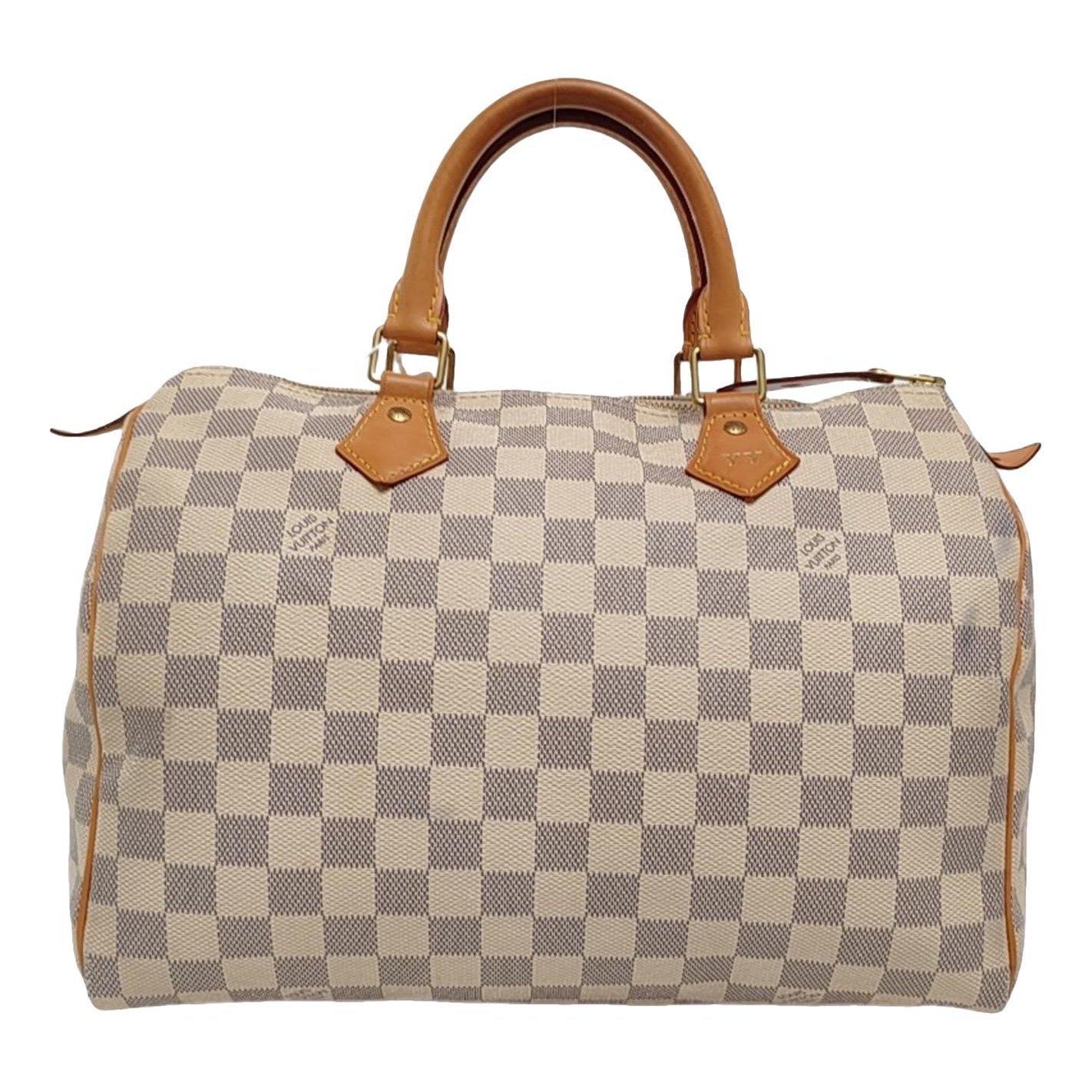 Nano Speedy / Mini HL leather handbag