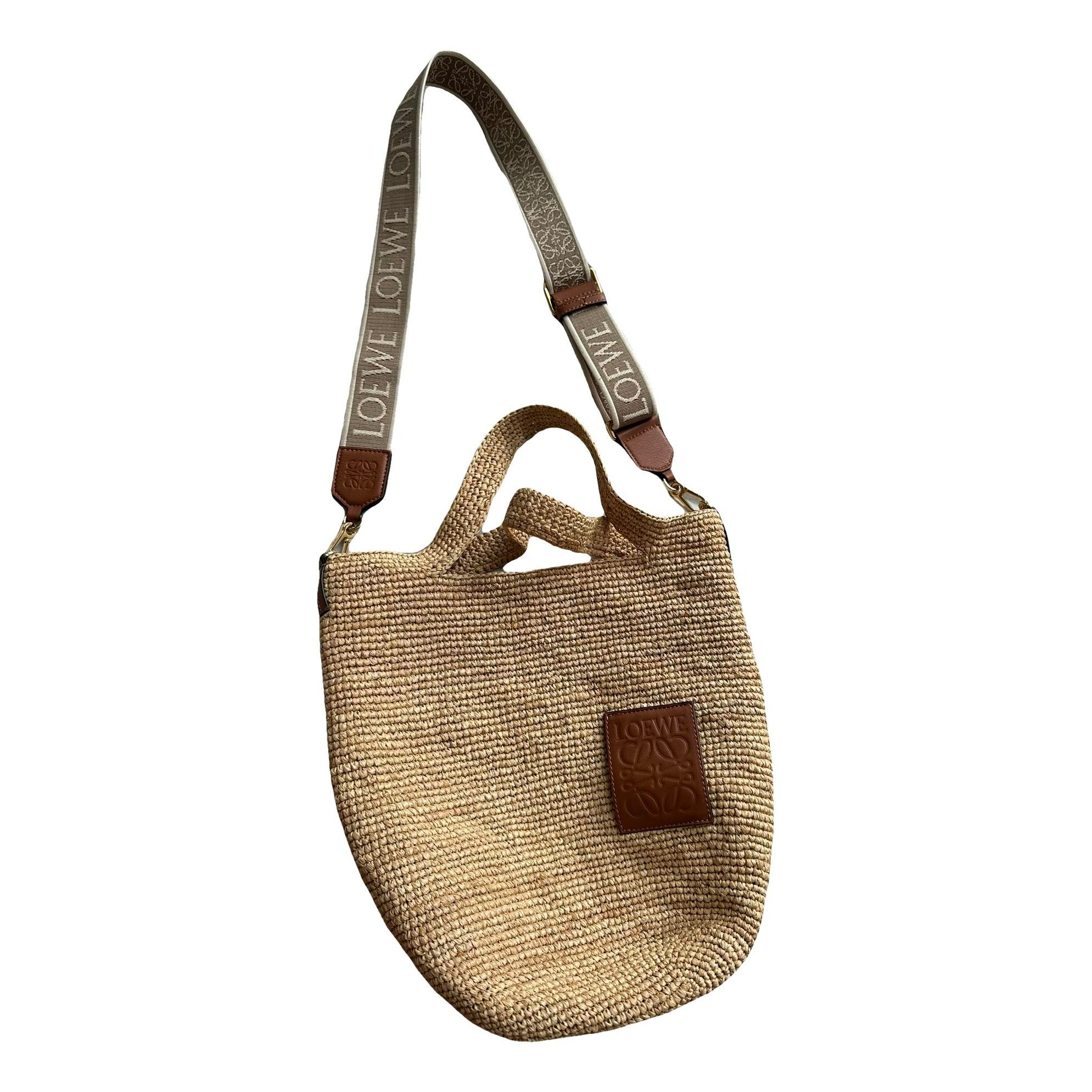Slit leather handbag