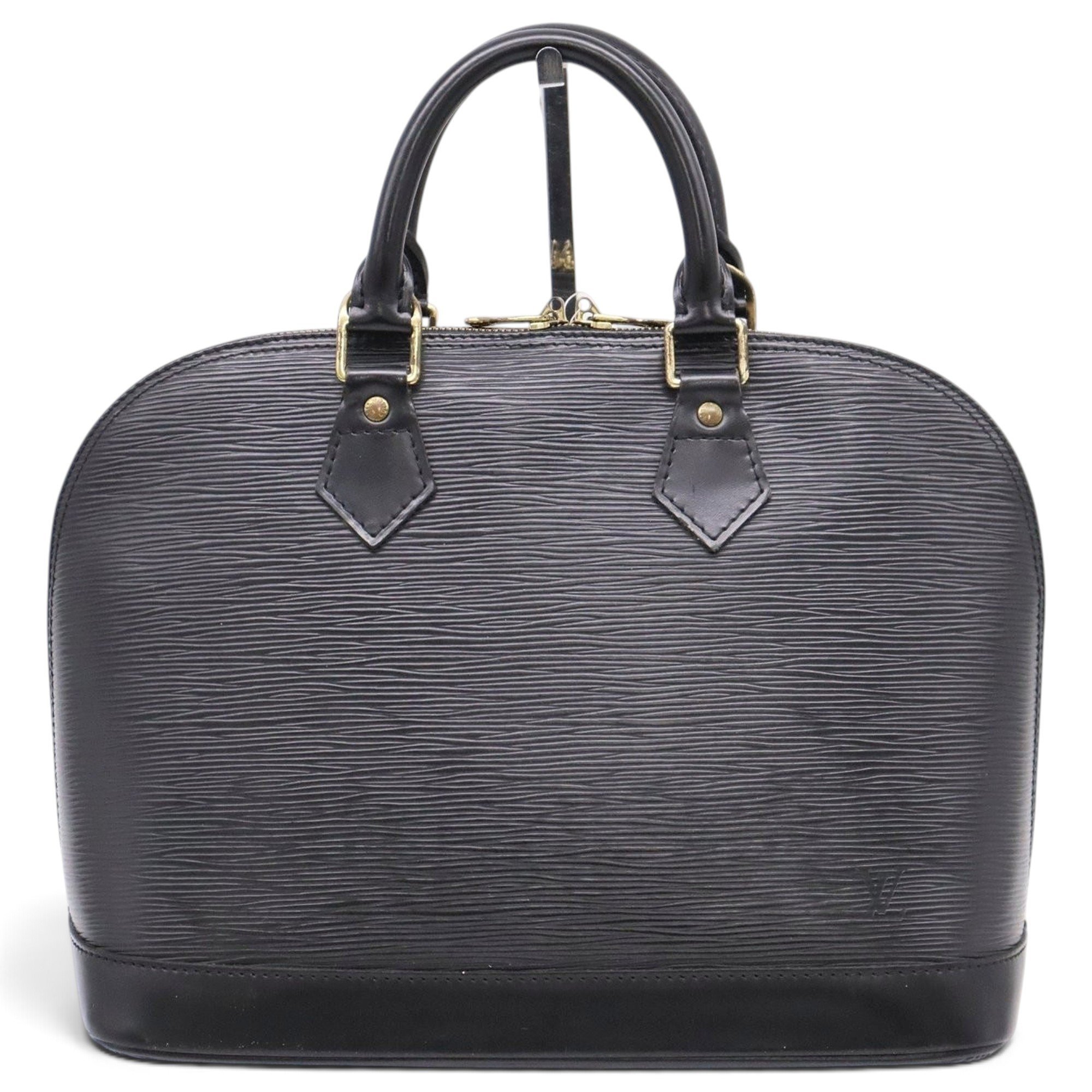 Louis Vuitton Alma cloth handbag