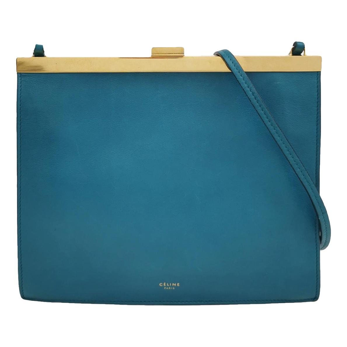Clasp leather handbag