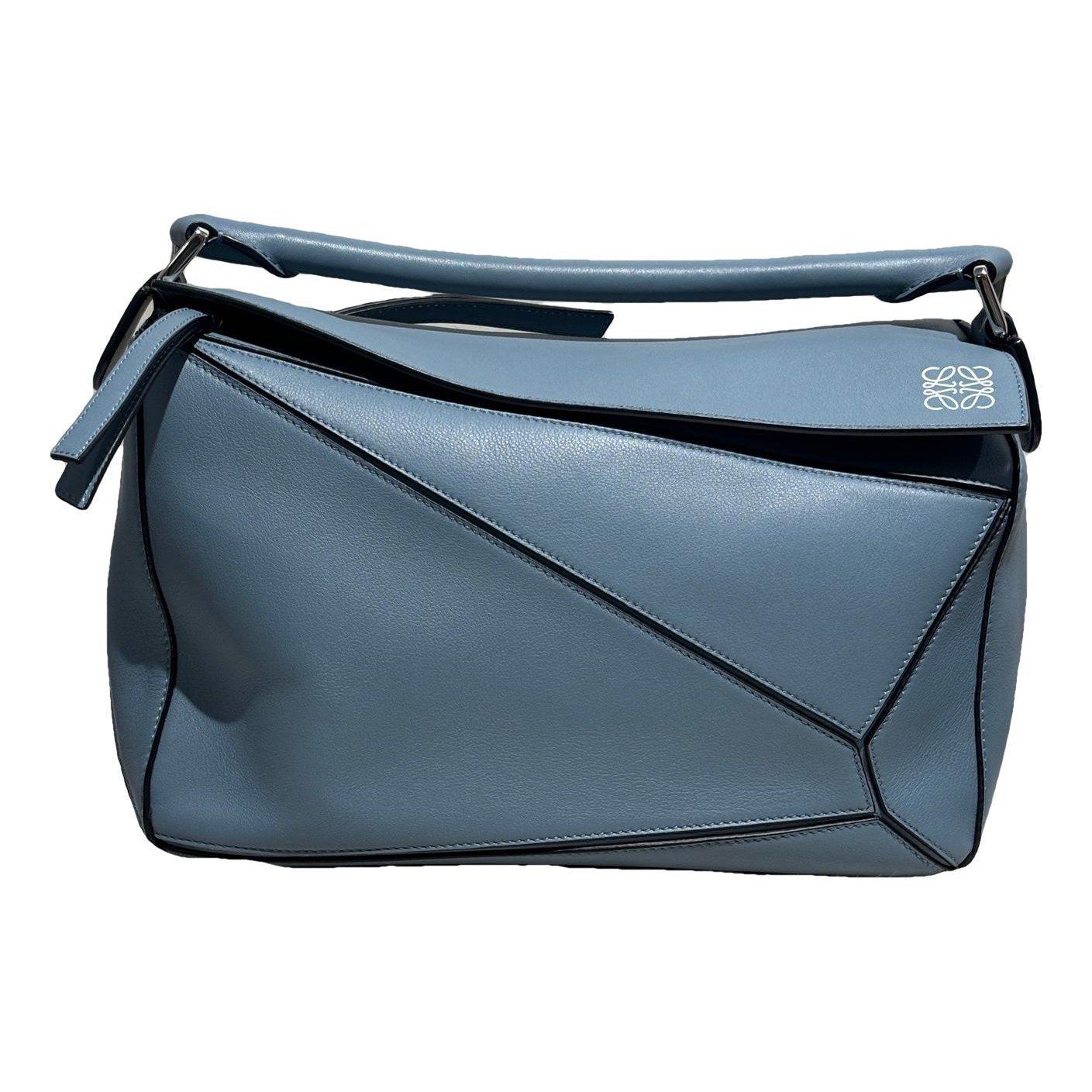 Puzzle leather handbag