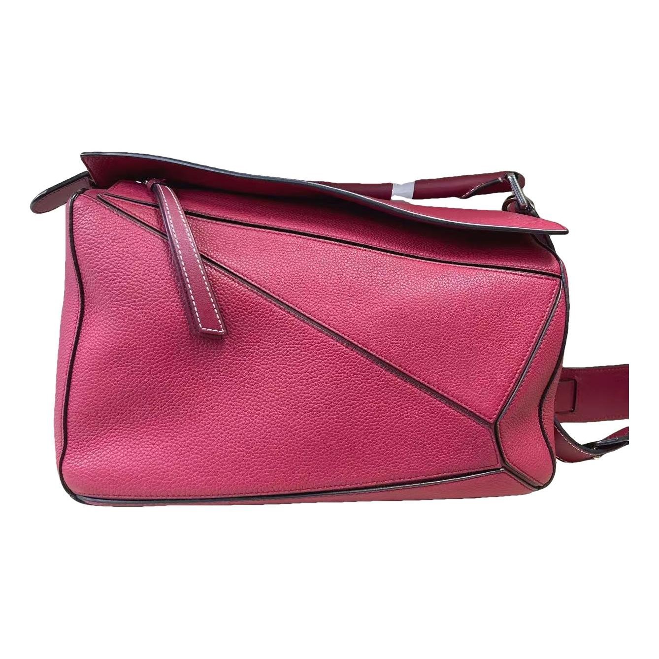 Puzzle leather handbag