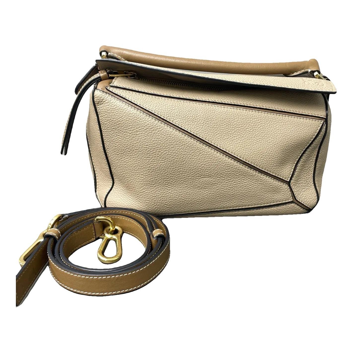 Puzzle leather handbag