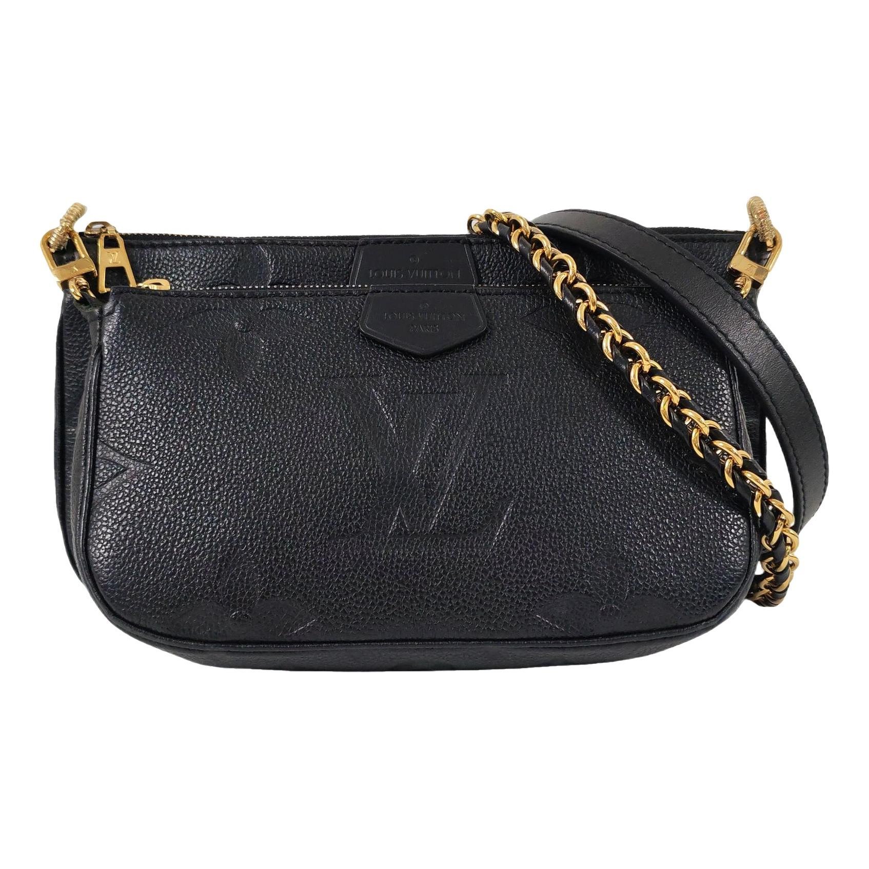 Maxi Multi Pochette Accessoires leather handbag