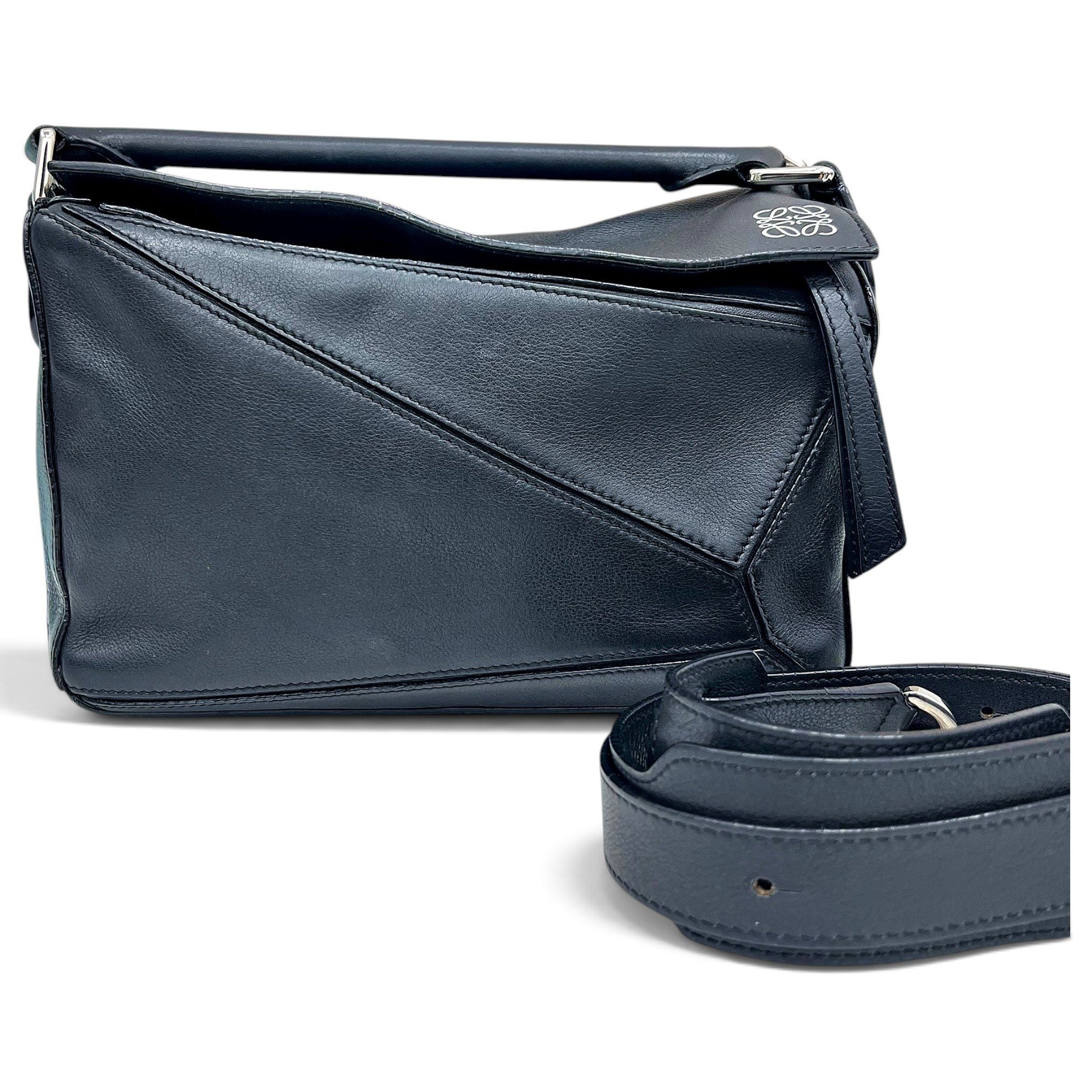 Puzzle leather handbag