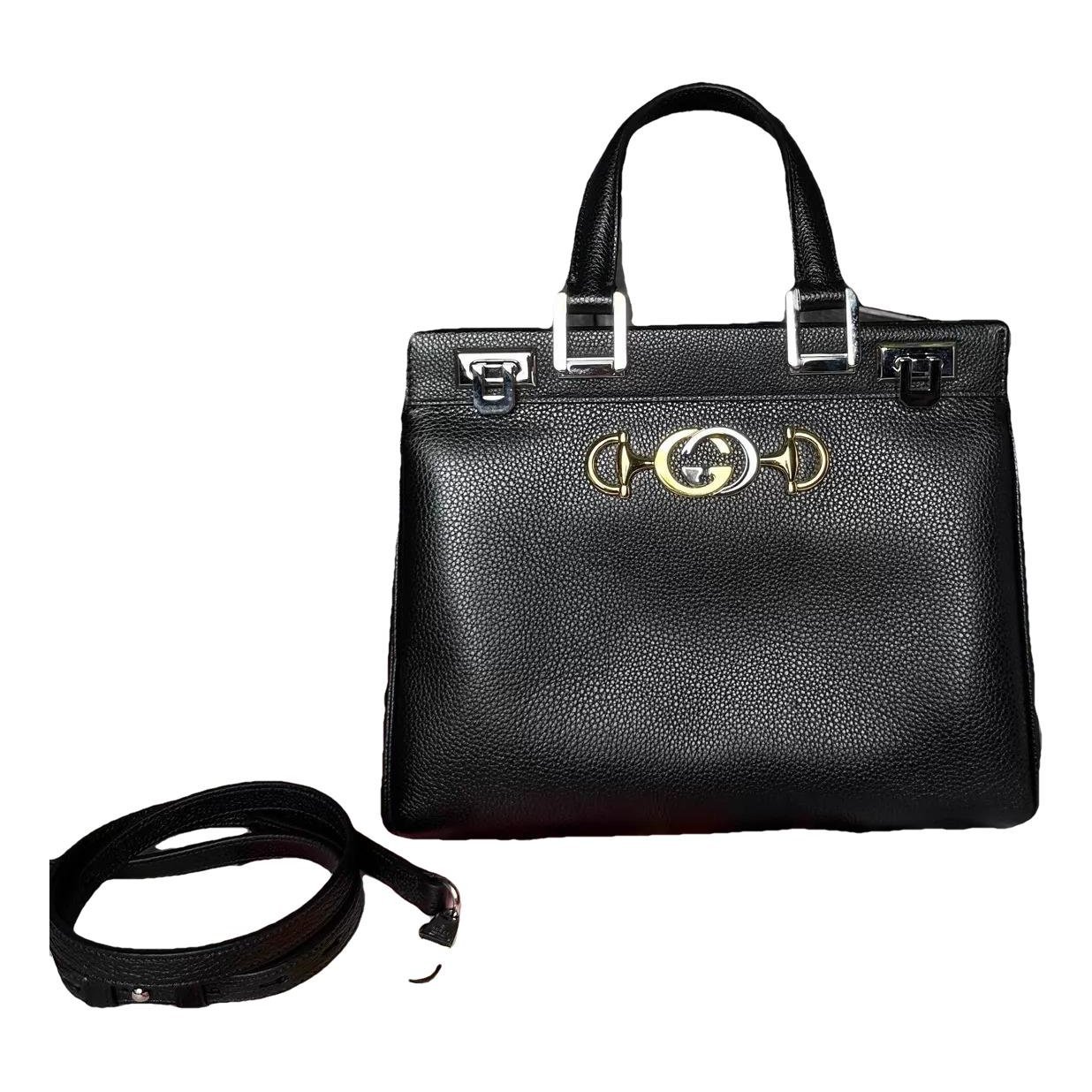 Zumi leather handbag