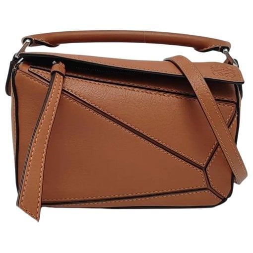 Puzzle leather handbag