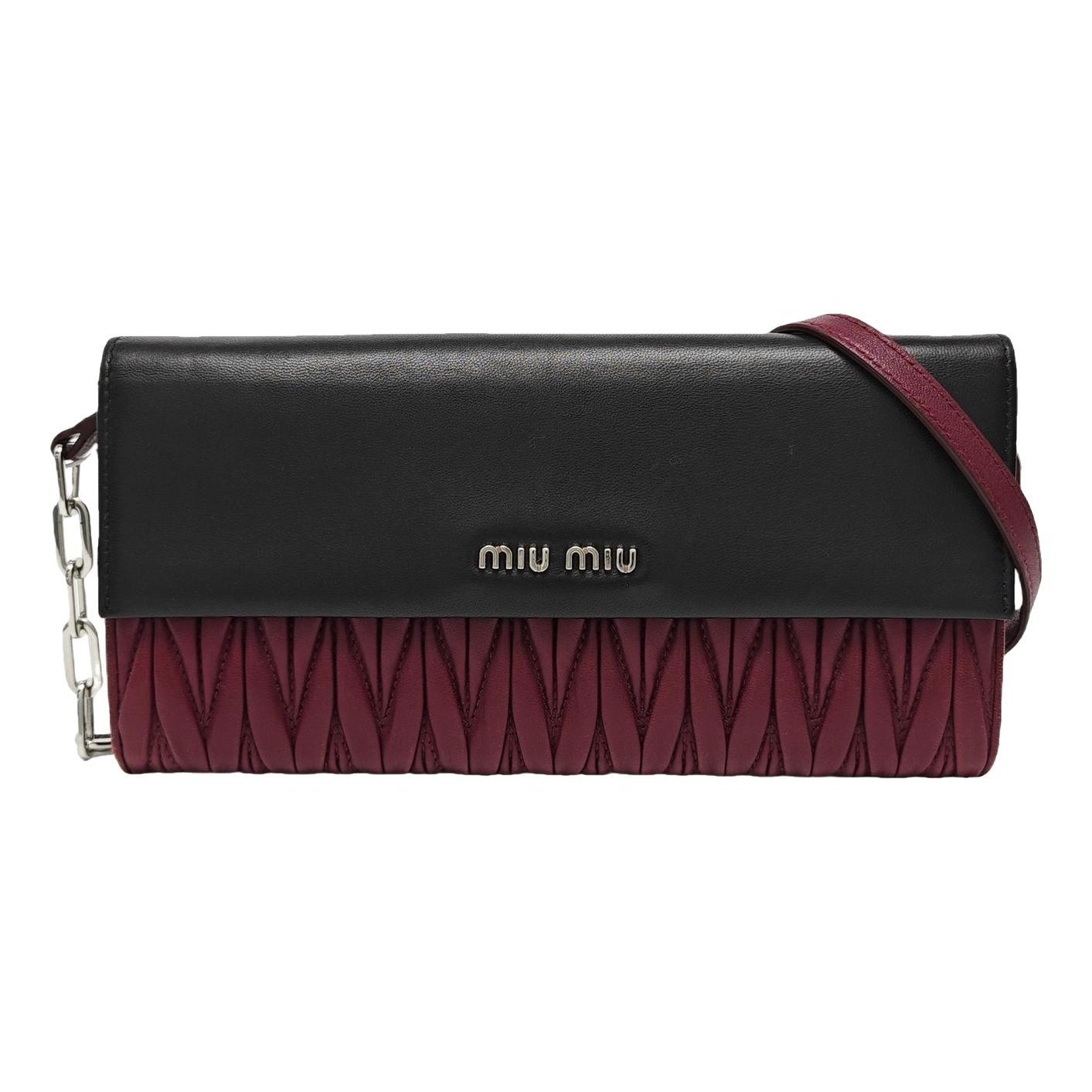 Miu Crystal leather handbag
