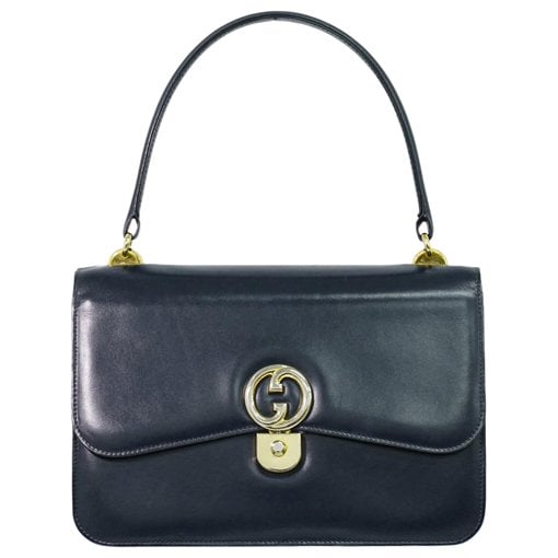 Ophidia Top Handle leather handbag