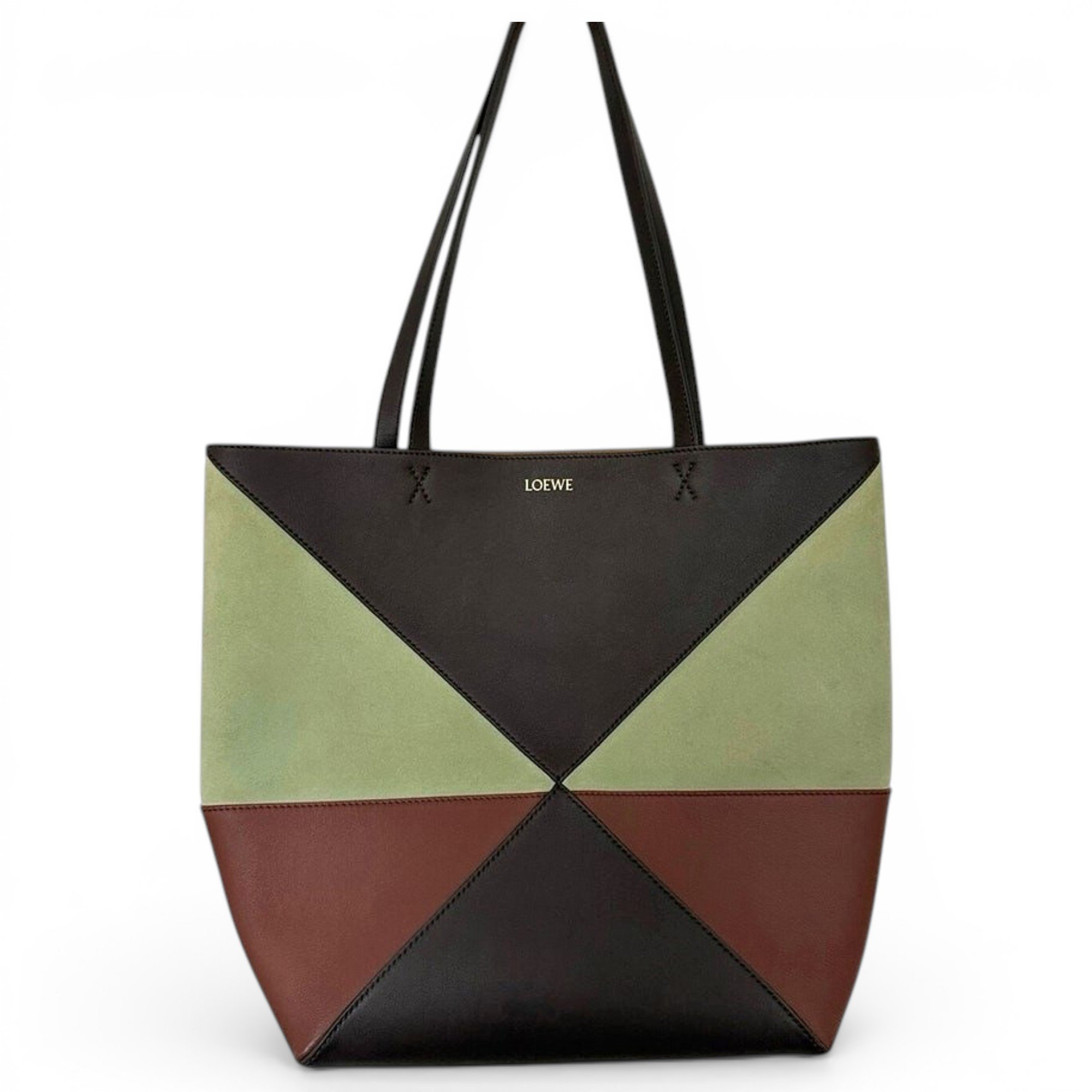 Puzzle leather clutch bag