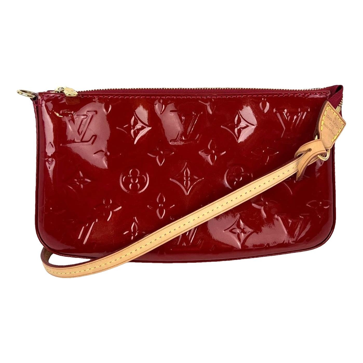Pochette Accessoire patent leather handbag