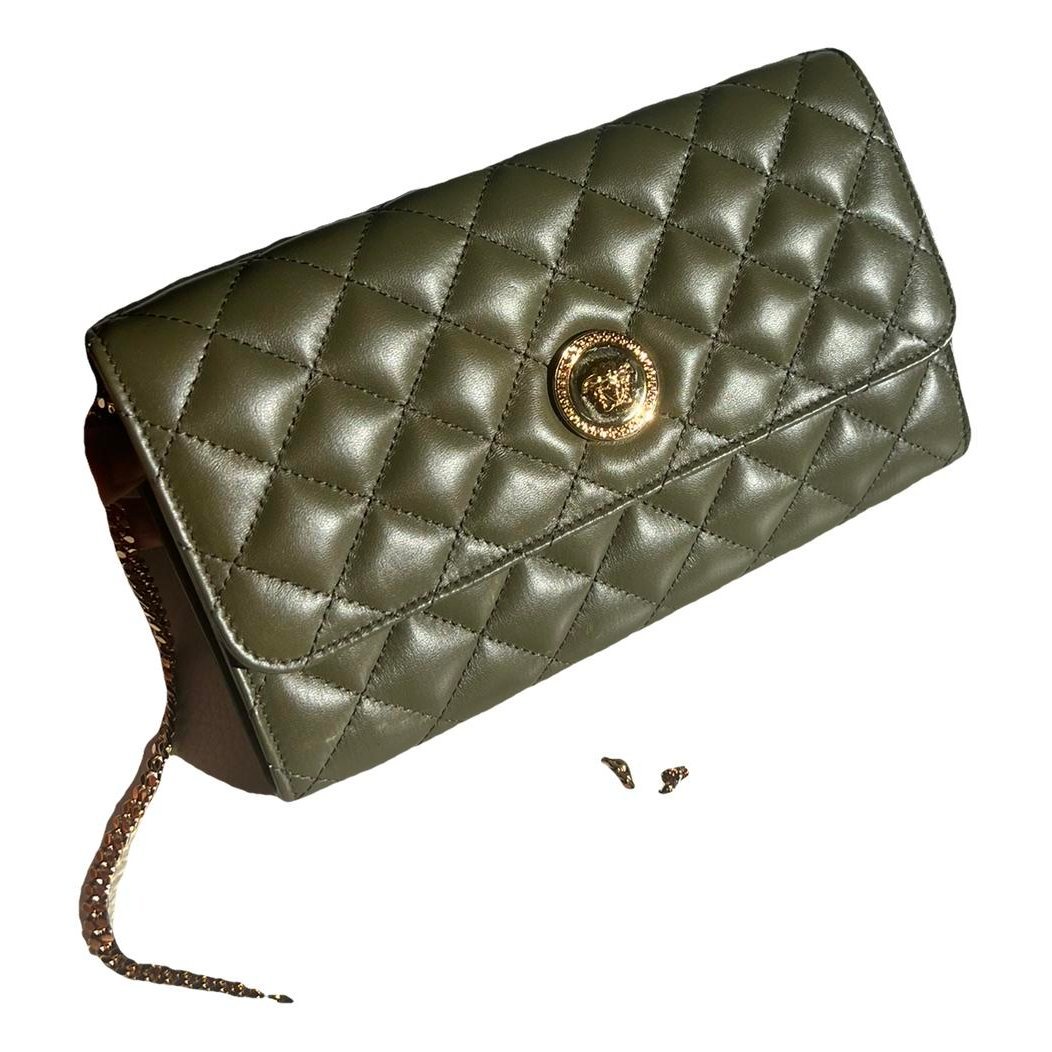 La Medusa leather clutch bag