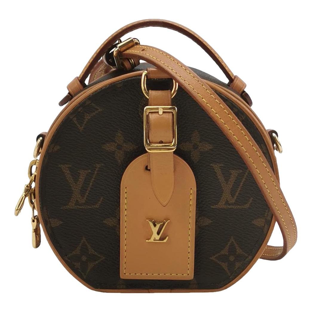 Boîte chapeau souple vinyl crossbody bag