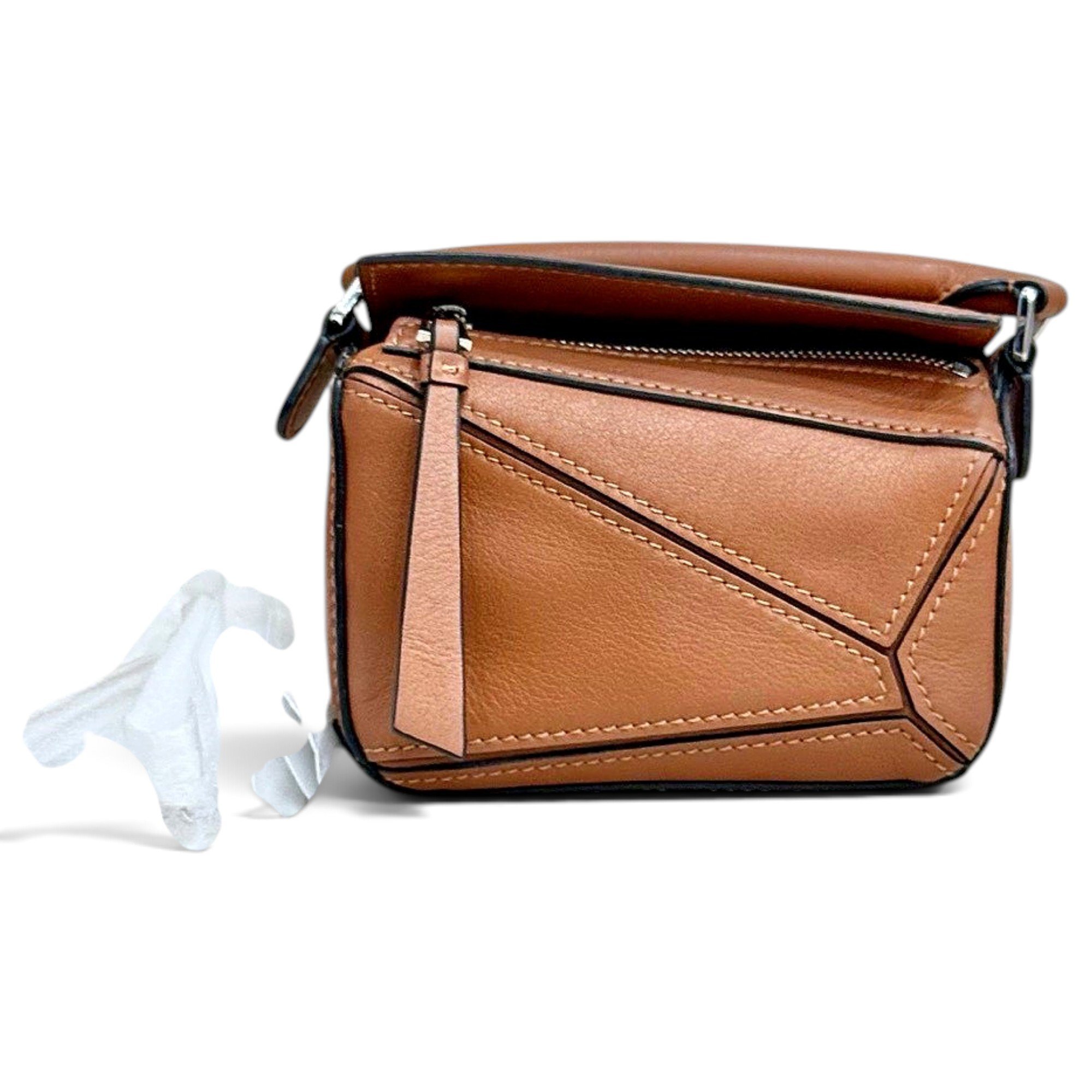 Puzzle leather handbag