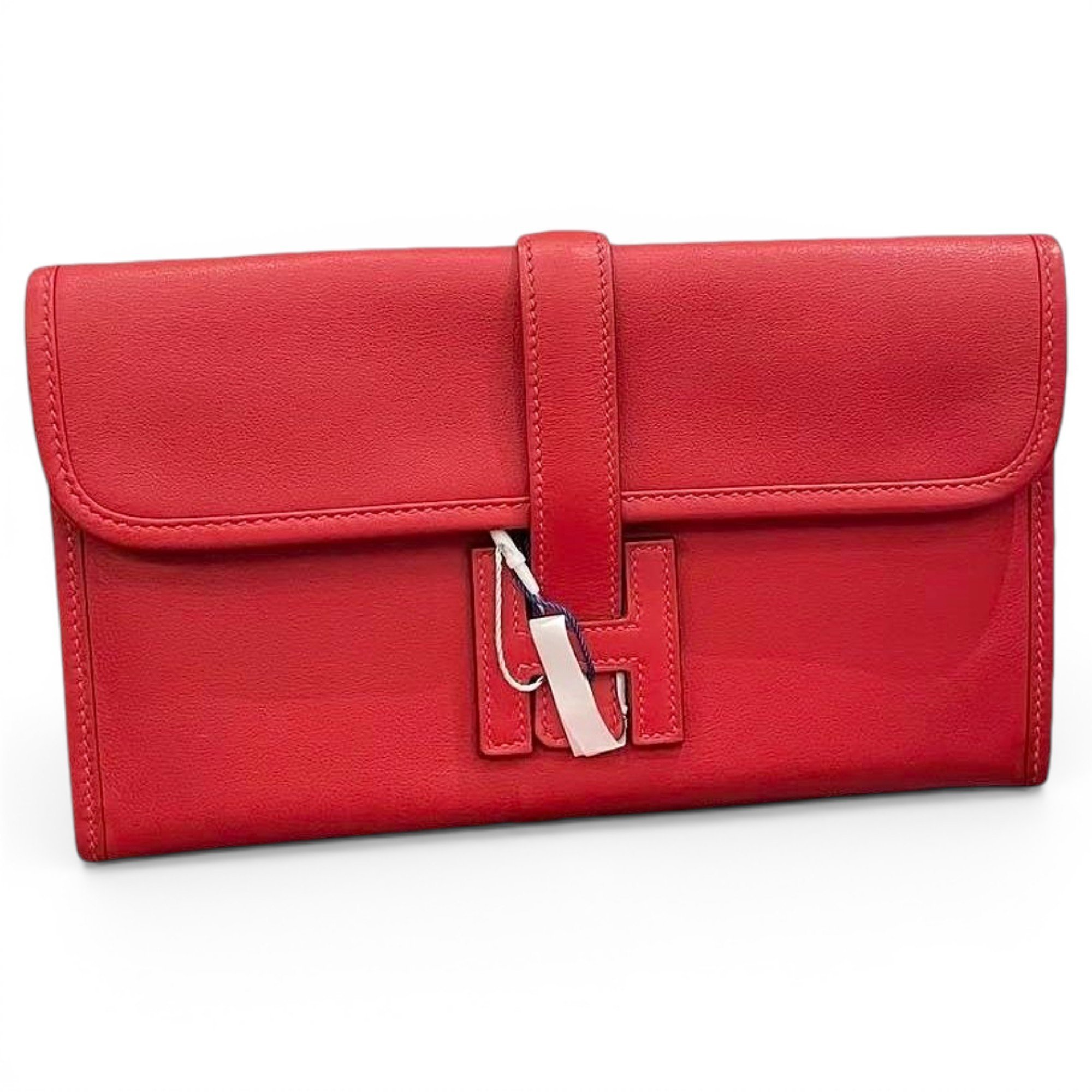 Jige leather clutch bag