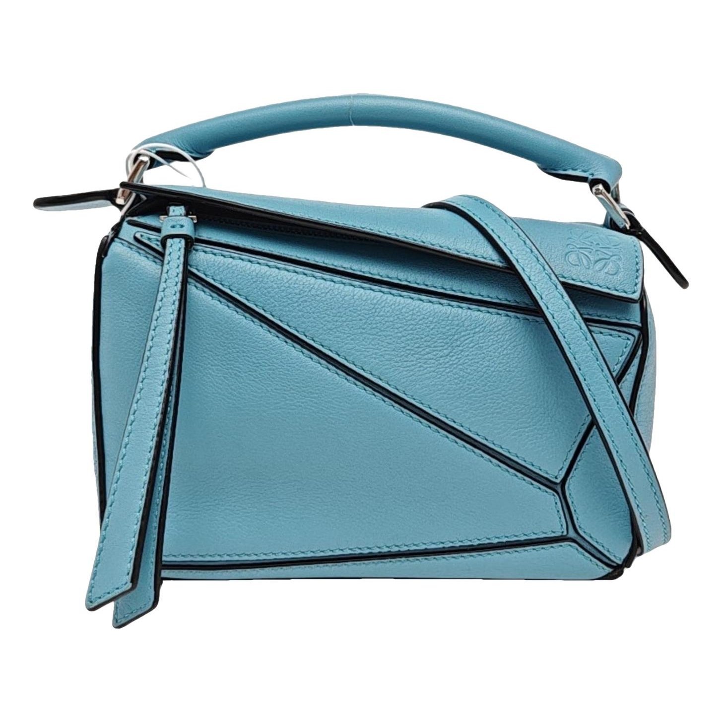 Puzzle leather handbag