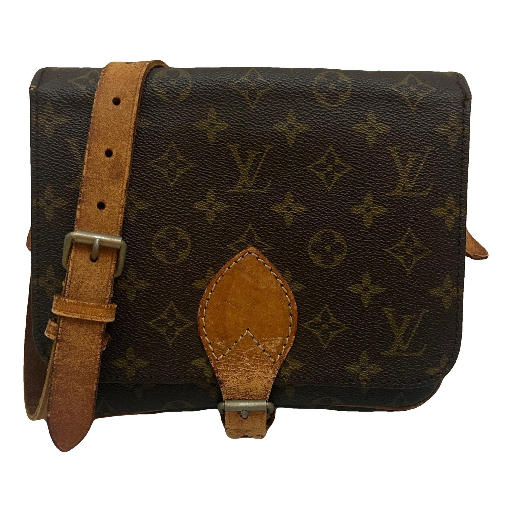 Cartouchière leather handbag